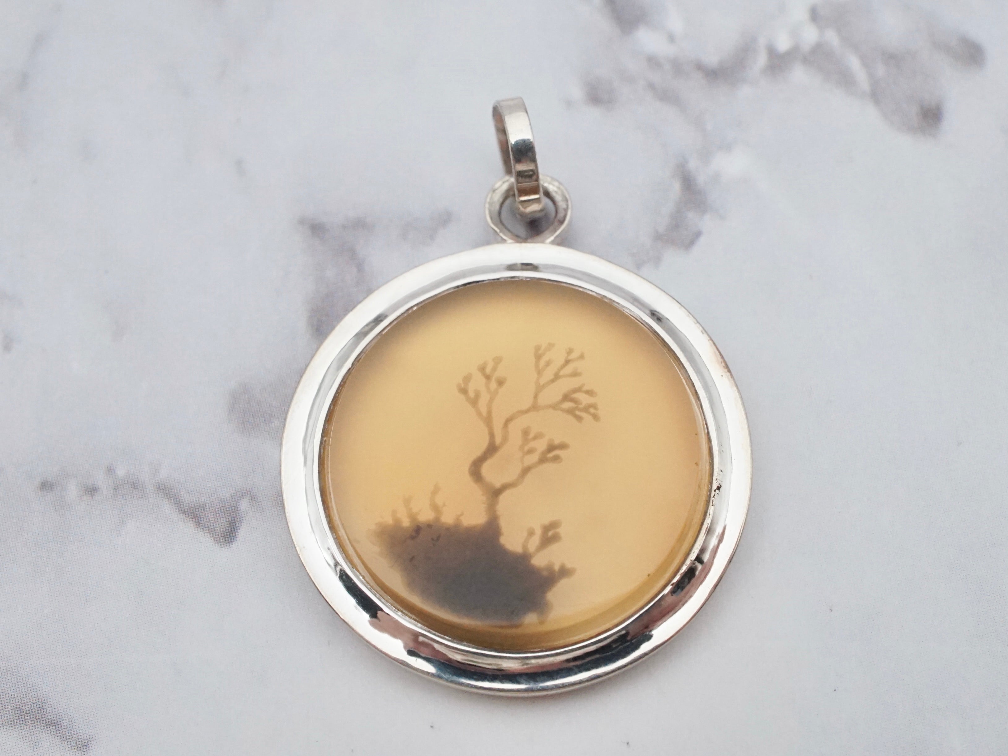 Vintage sterling and dendritic agate pendant