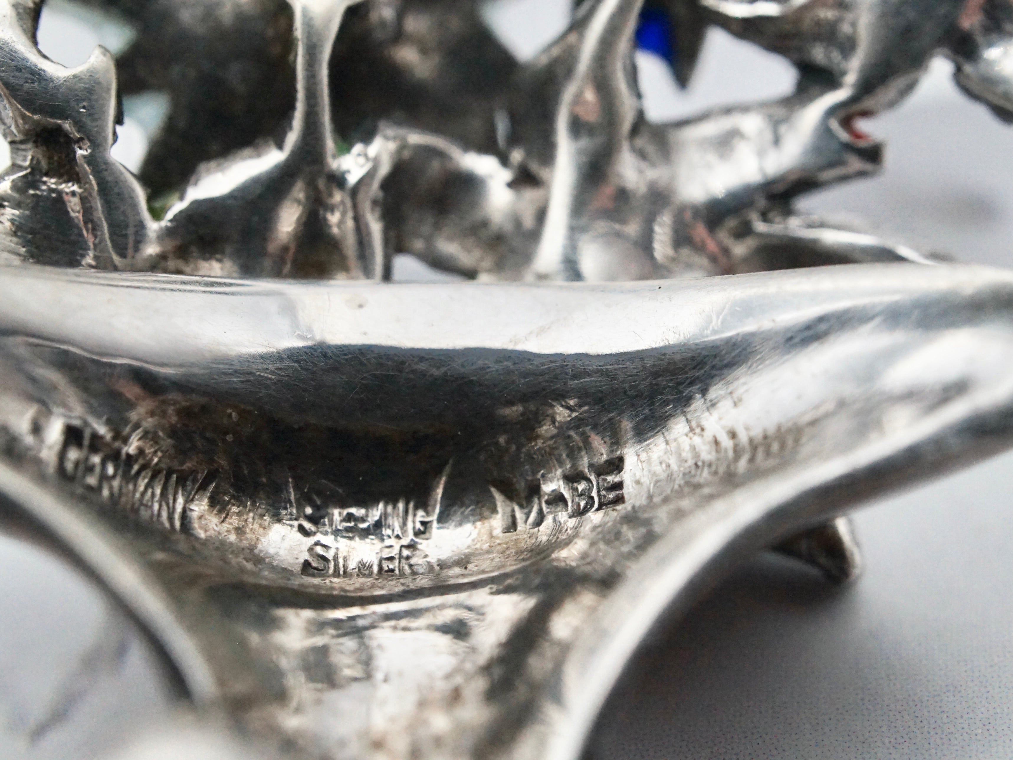 Antique German sterling, enamel, & marcasite Maison Behar Co. floral brooch