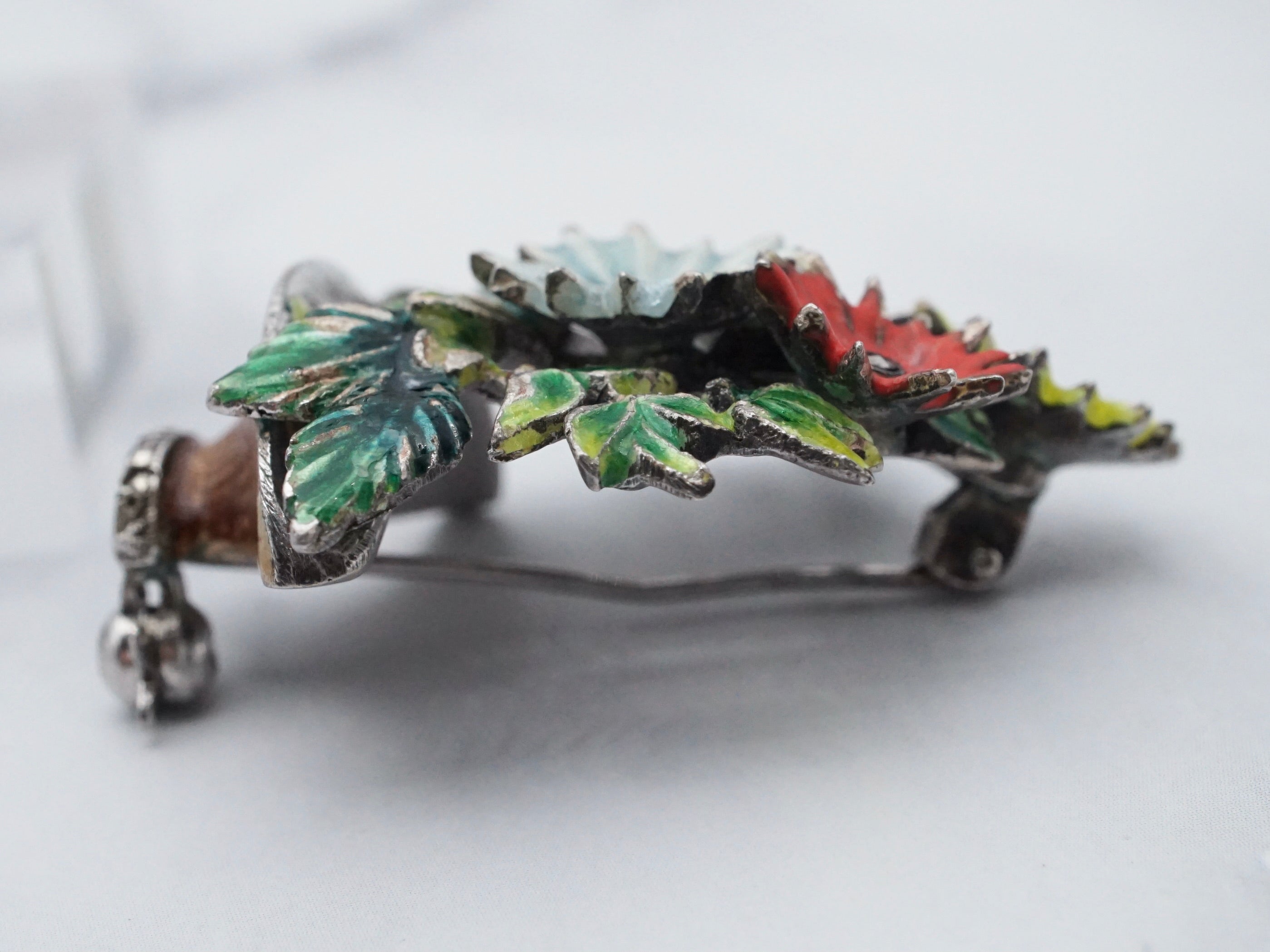 Antique German sterling, enamel, & marcasite Maison Behar Co. floral brooch