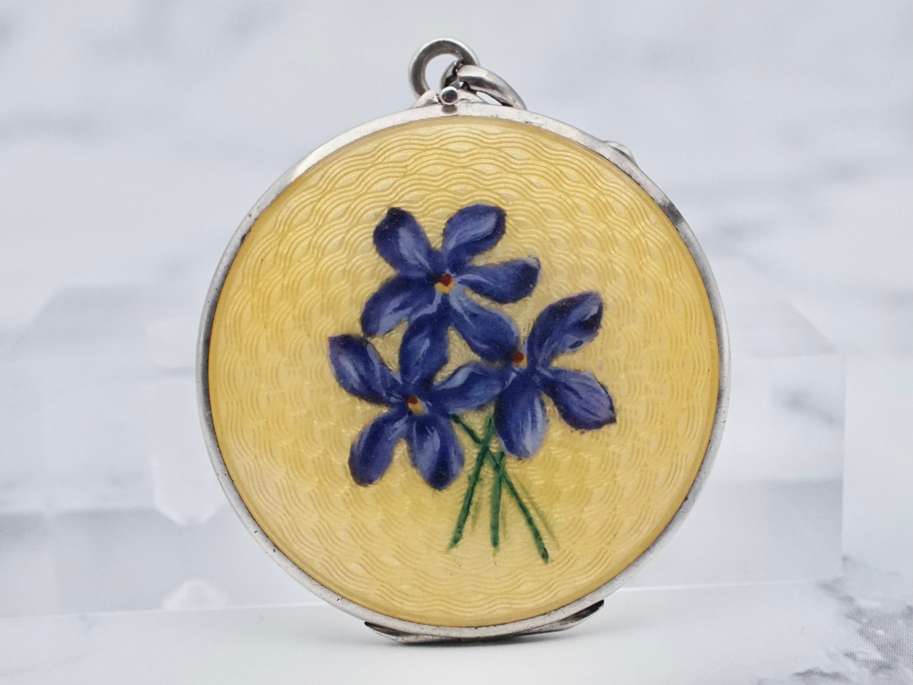 Antique .900 silver hand-painted yellow guilloche enamel locket with purple flowers