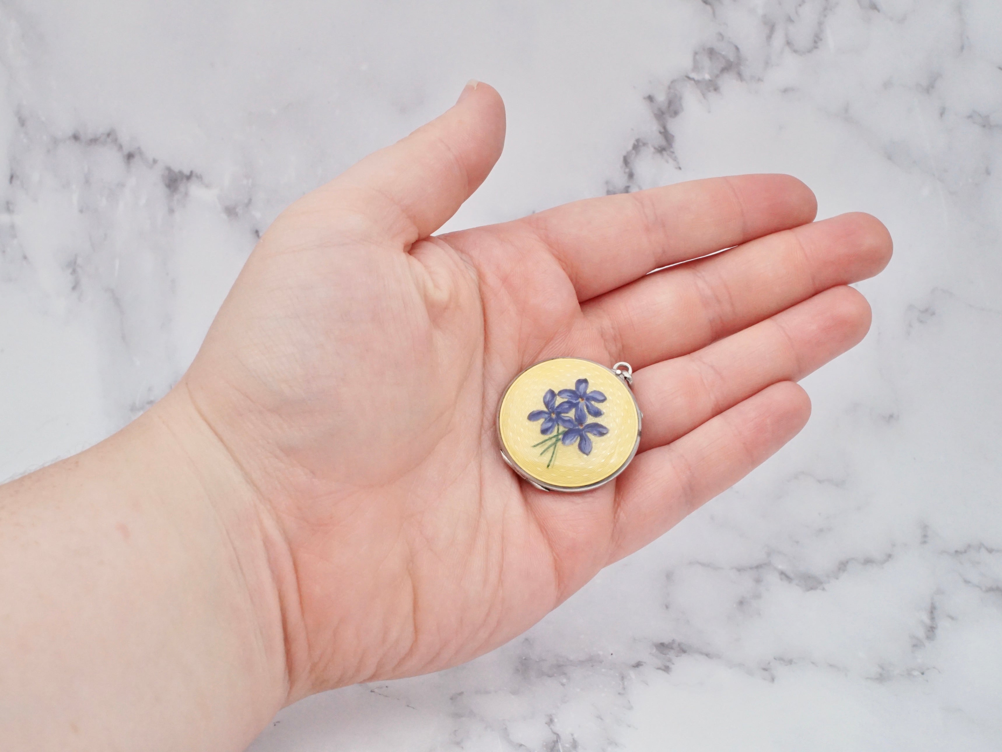 Antique .900 silver hand-painted yellow guilloche enamel locket with purple flowers