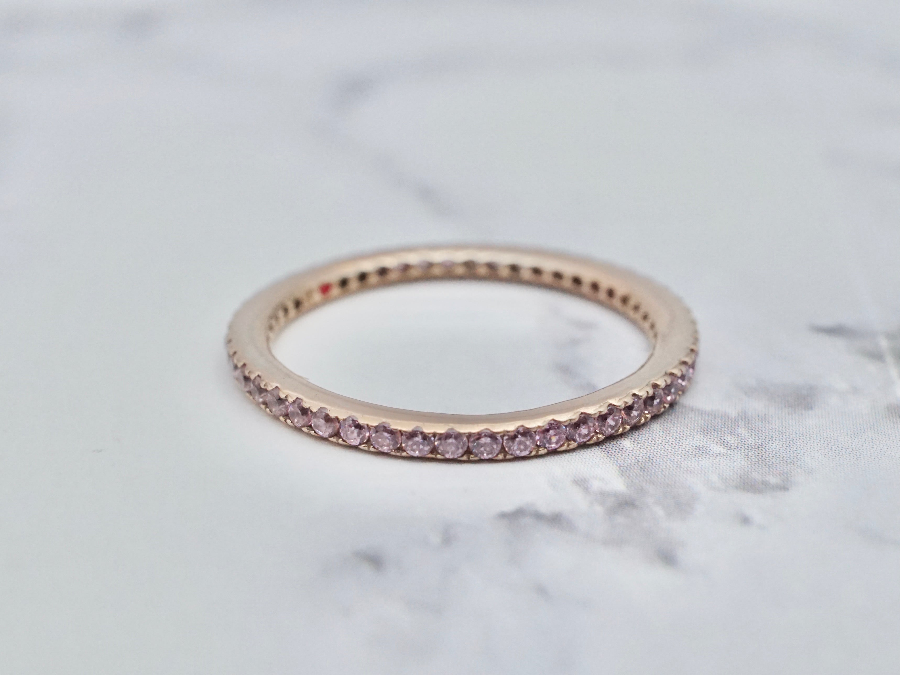 Vintage gold-plated sterling & pink cubic zirconia eternity band, size 6.25