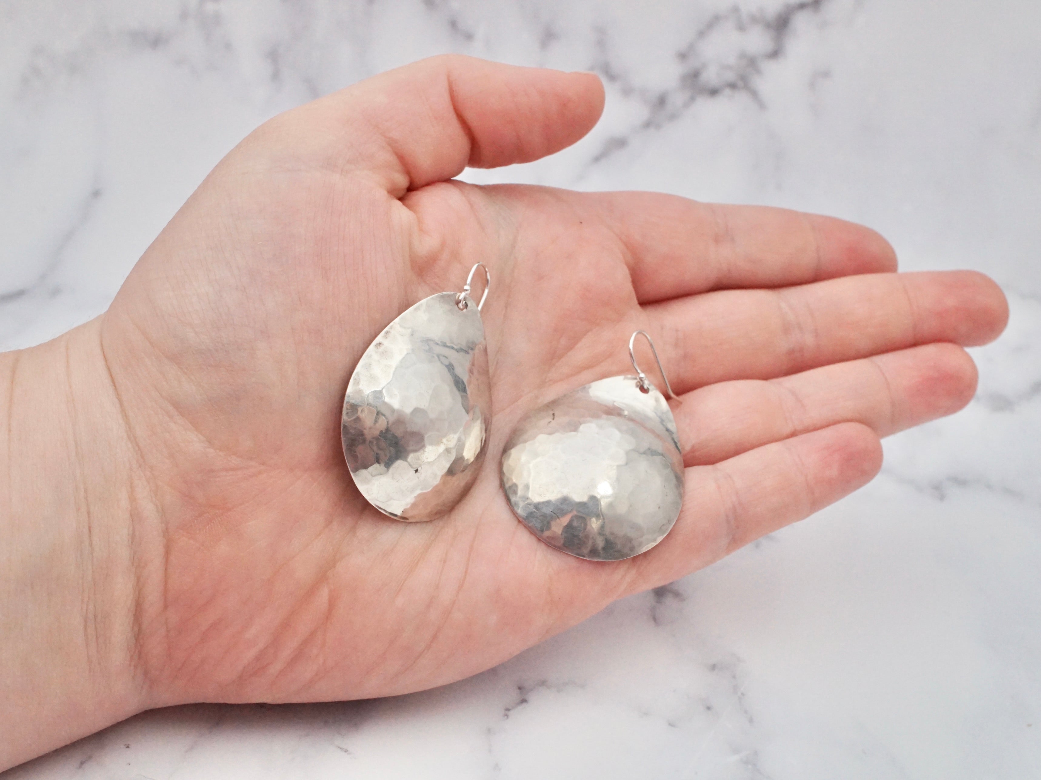 Vintage hand-hammered sterling disc earrings by Pearce