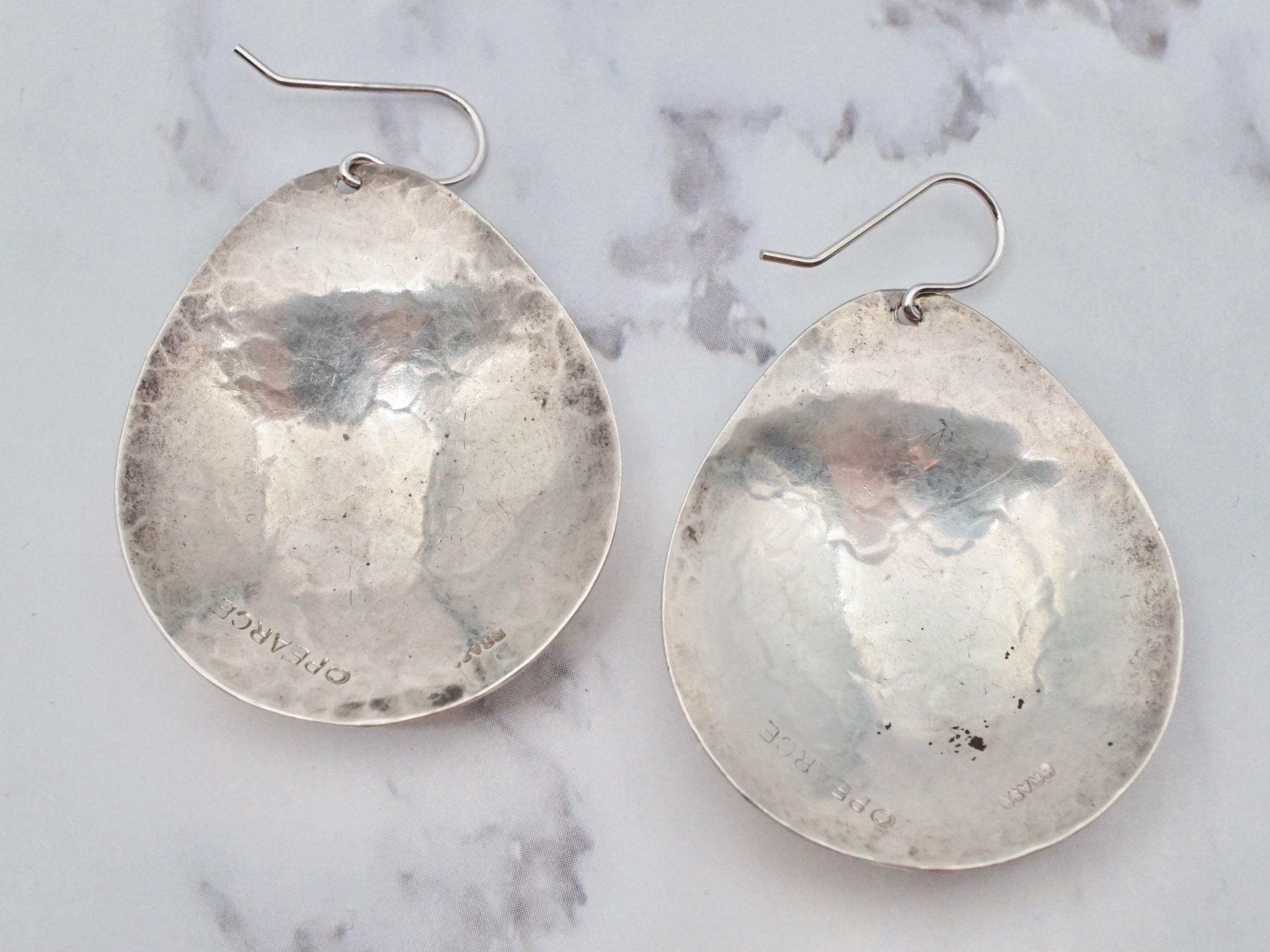 Vintage hand-hammered sterling disc earrings by Pearce