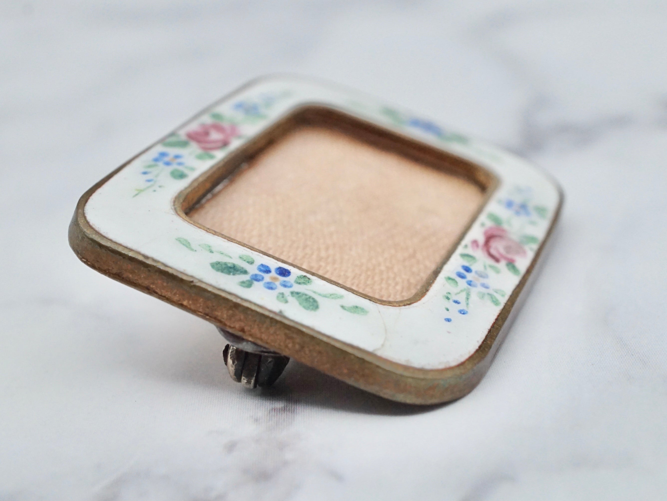 Antique hand-painted enamel and gilt metal frame brooch