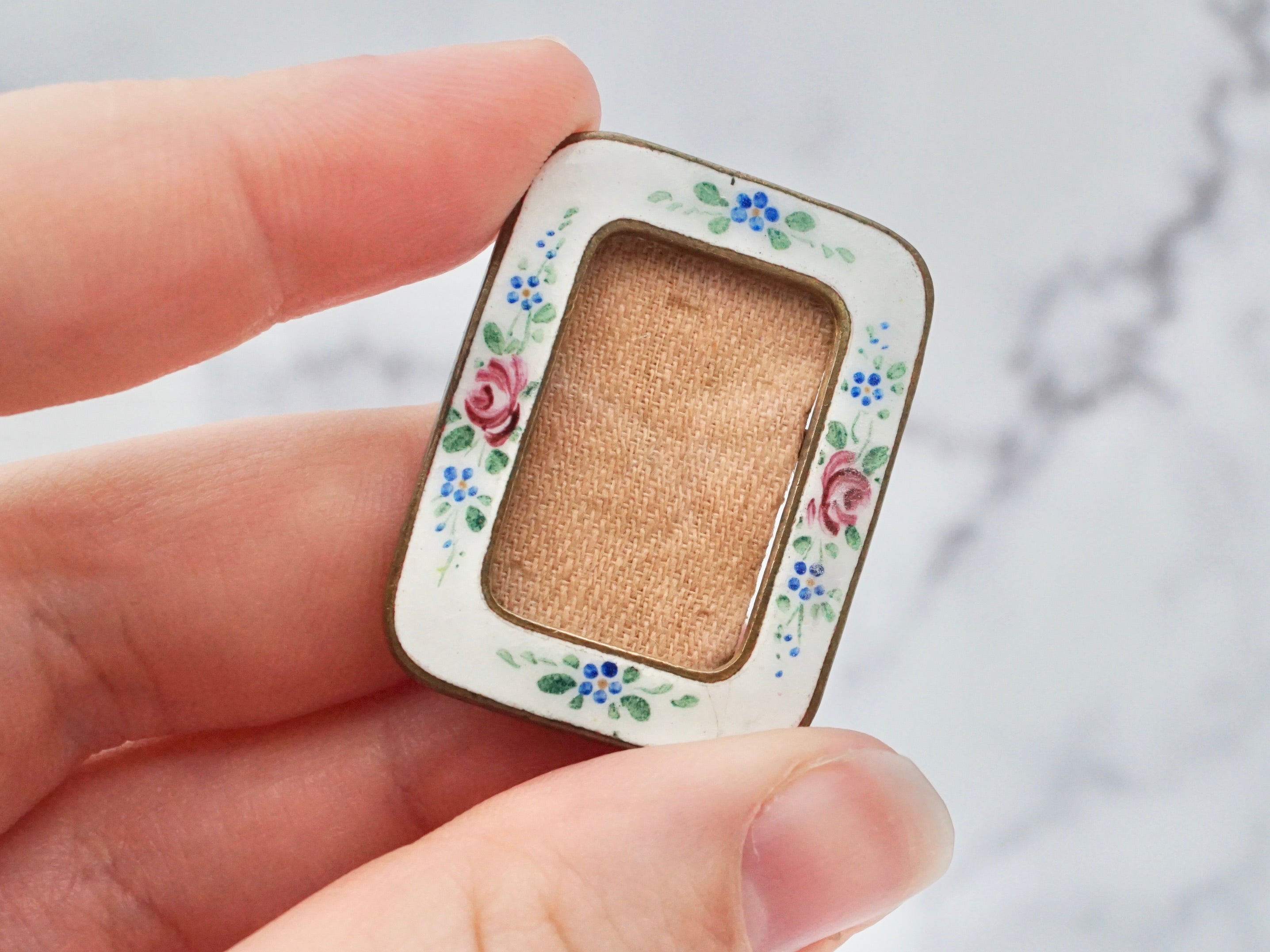 Antique hand-painted enamel and gilt metal frame brooch