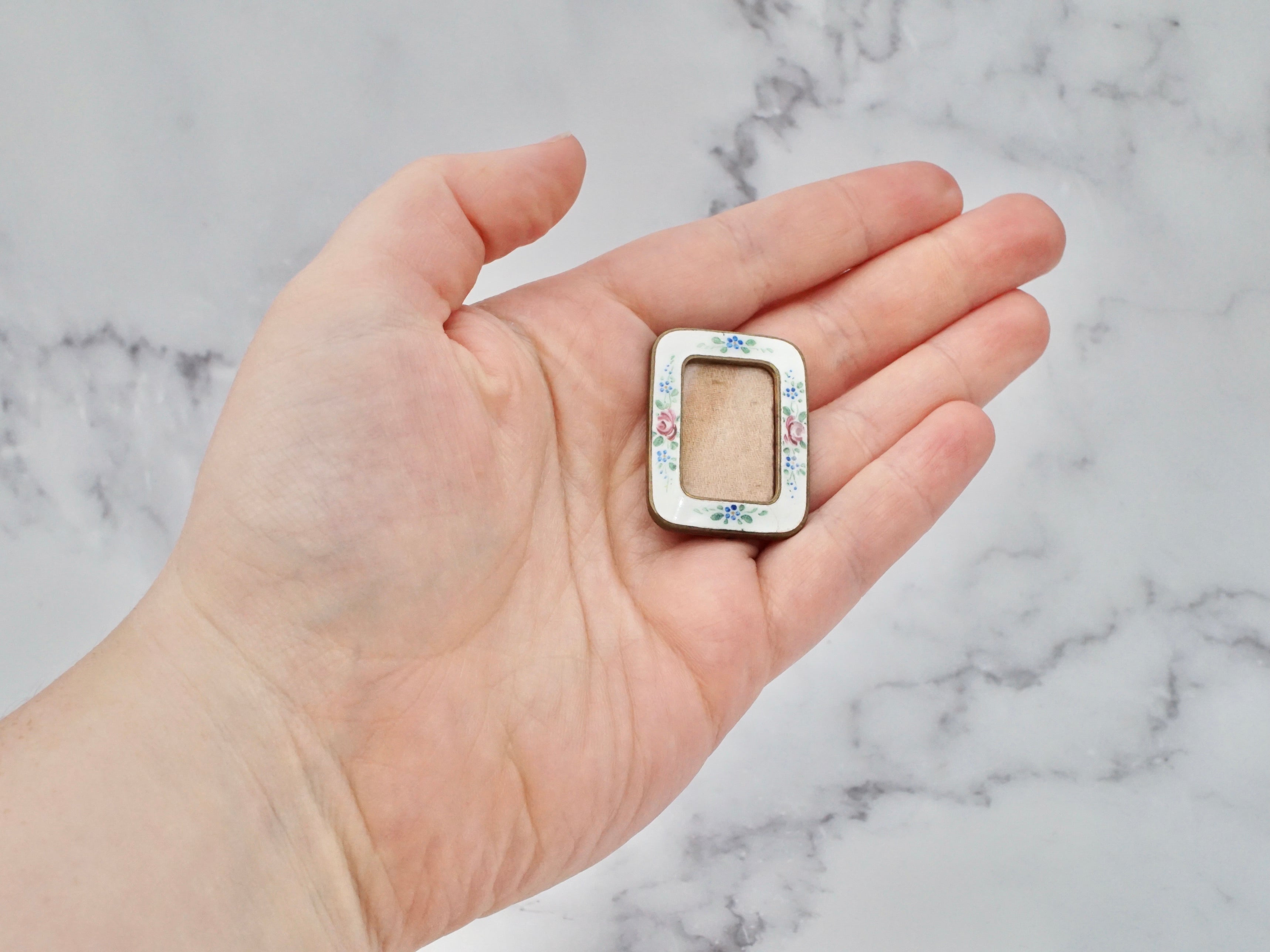 Antique hand-painted enamel and gilt metal frame brooch