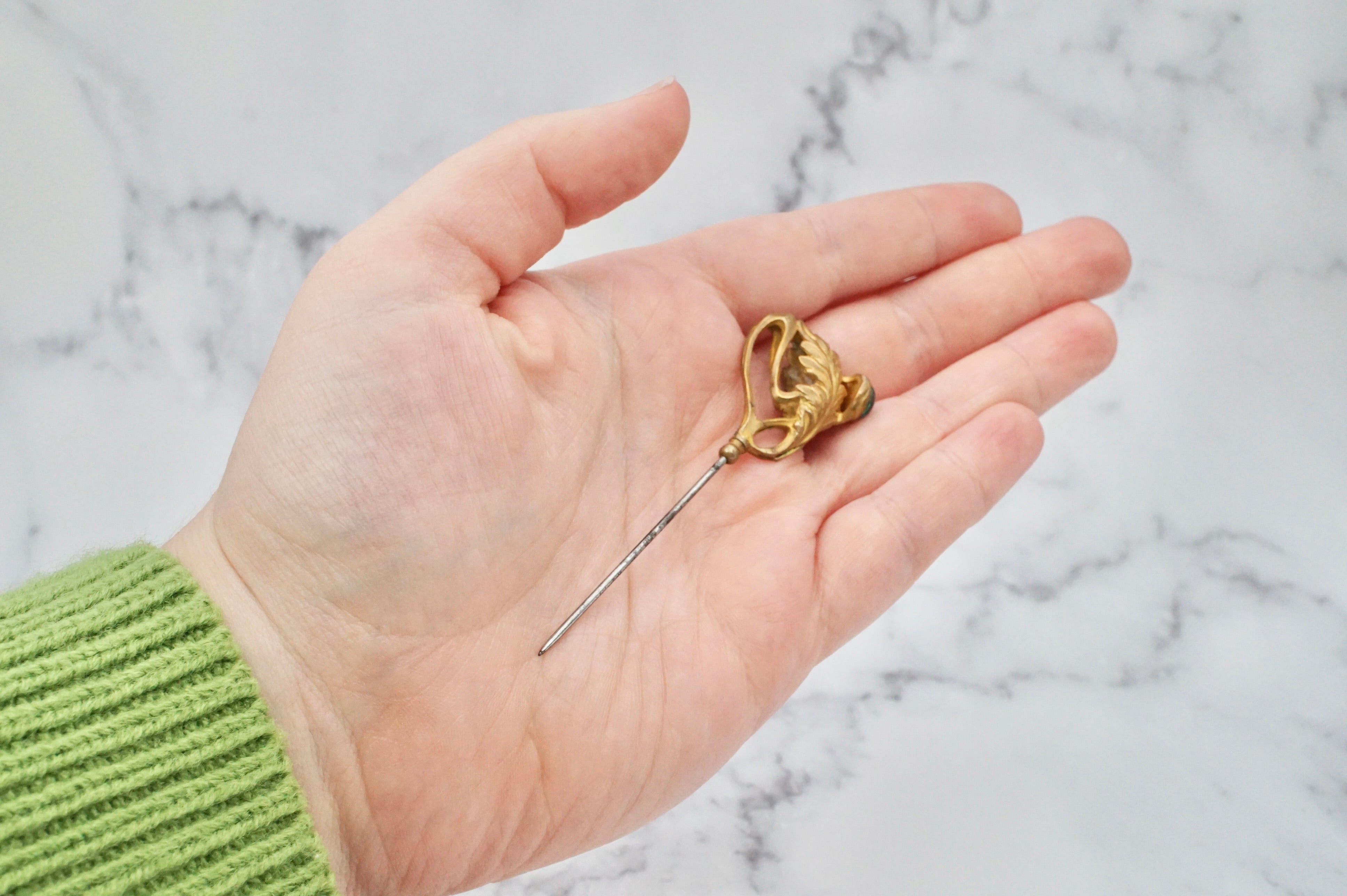 Antique Victorian gilt metal and glass peacock eye stickpin