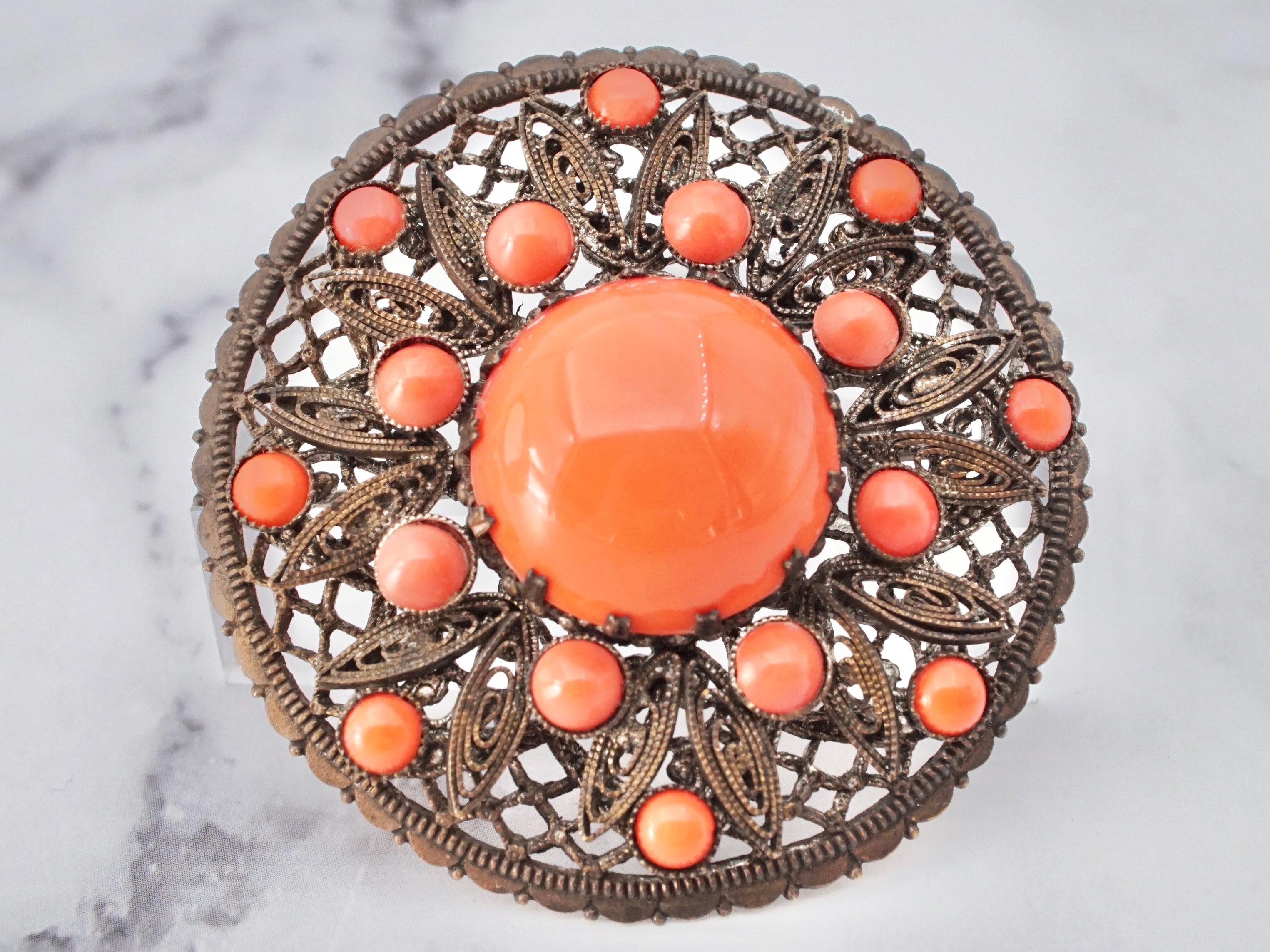 Antique Czech coral glass cabochon metal filigree brooch
