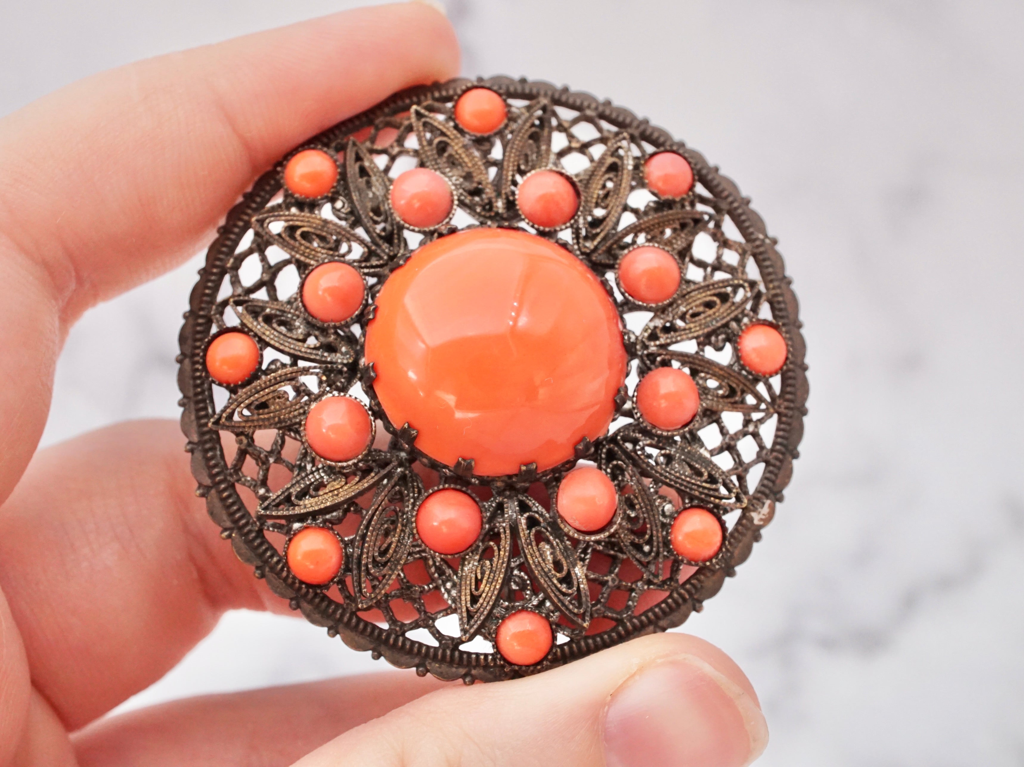 Antique Czech coral glass cabochon metal filigree brooch