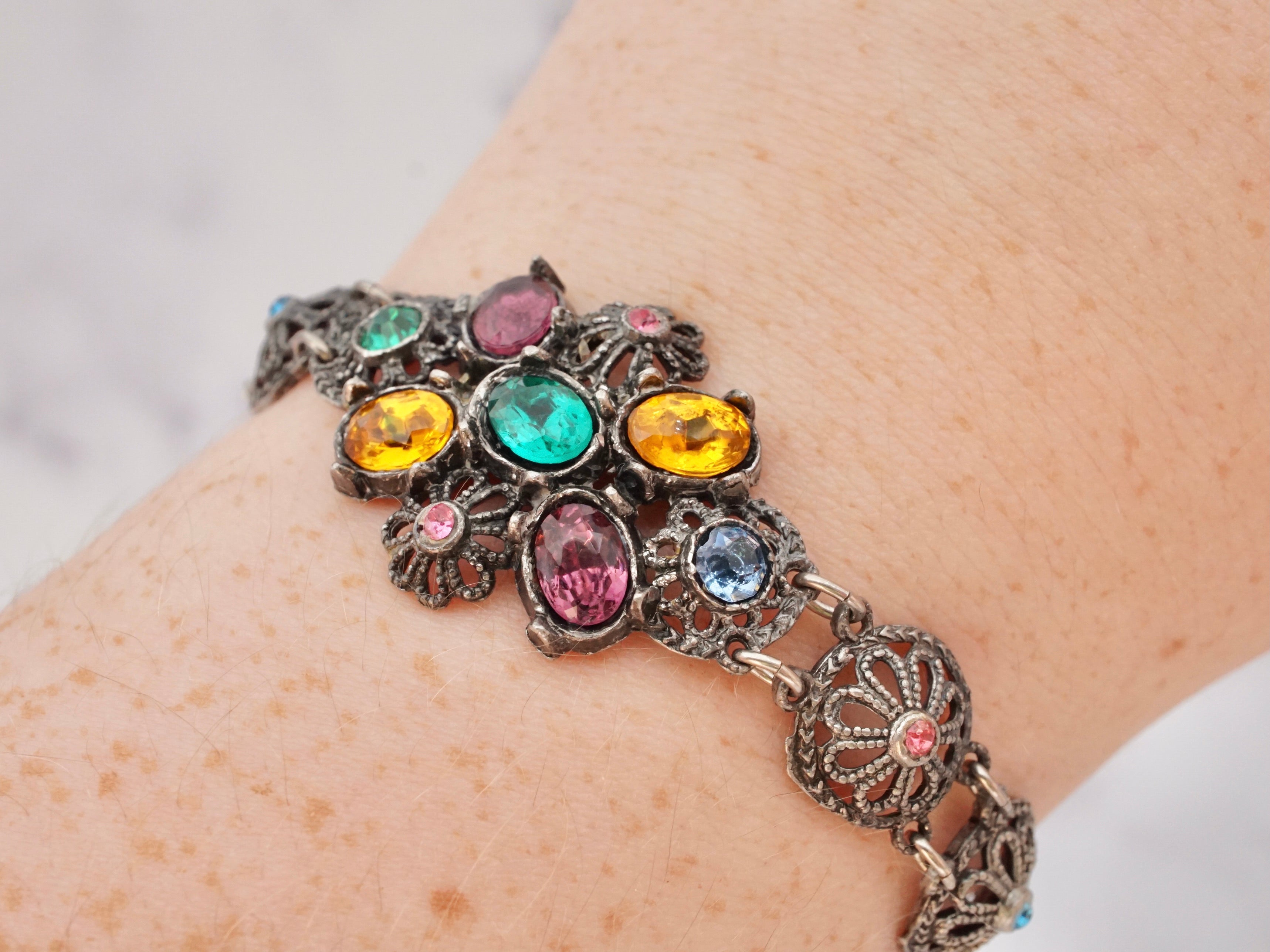 Antique harlequin Czech glass and metal filigree bracelet