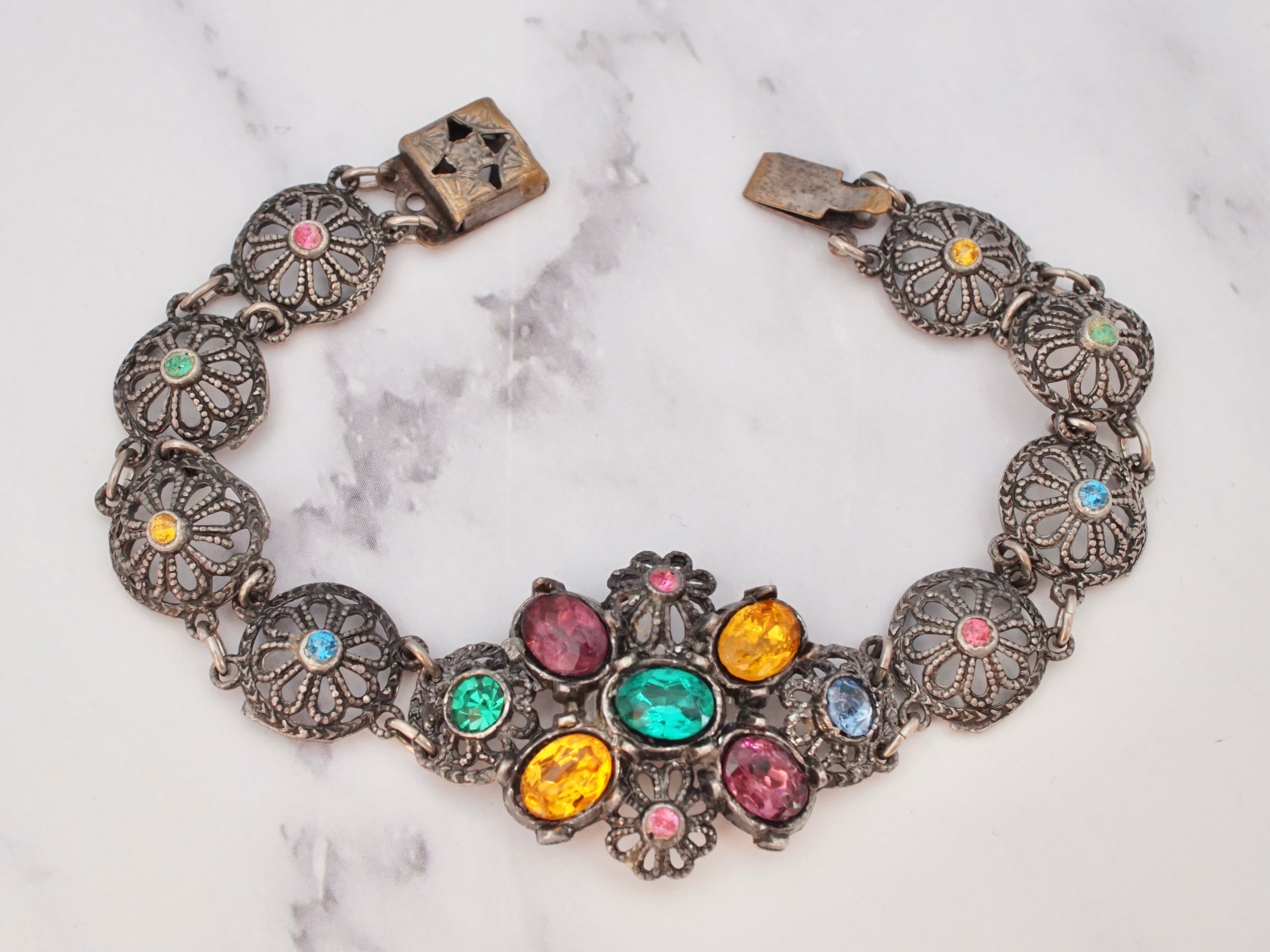 Antique harlequin Czech glass and metal filigree bracelet