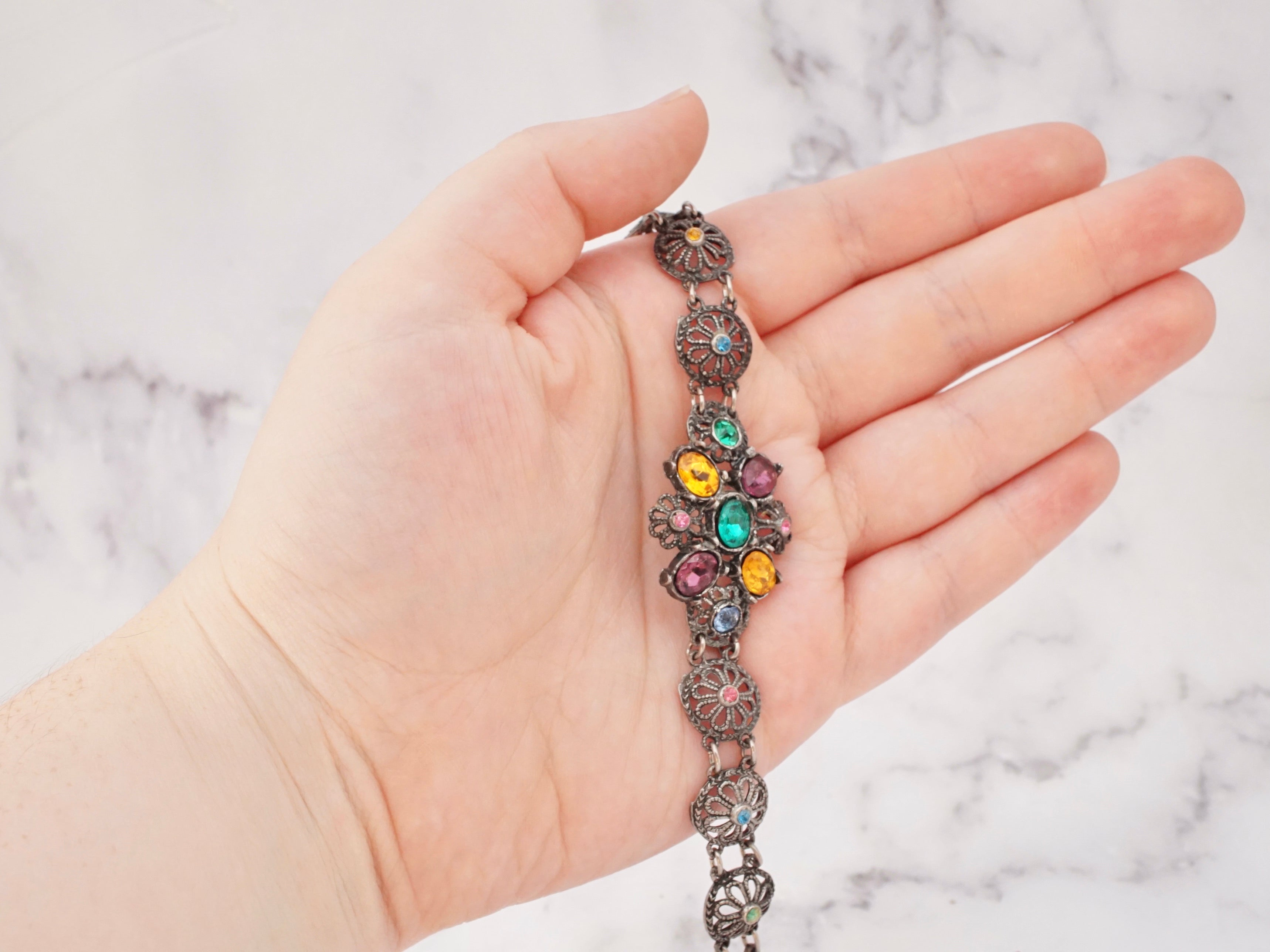 Antique harlequin Czech glass and metal filigree bracelet