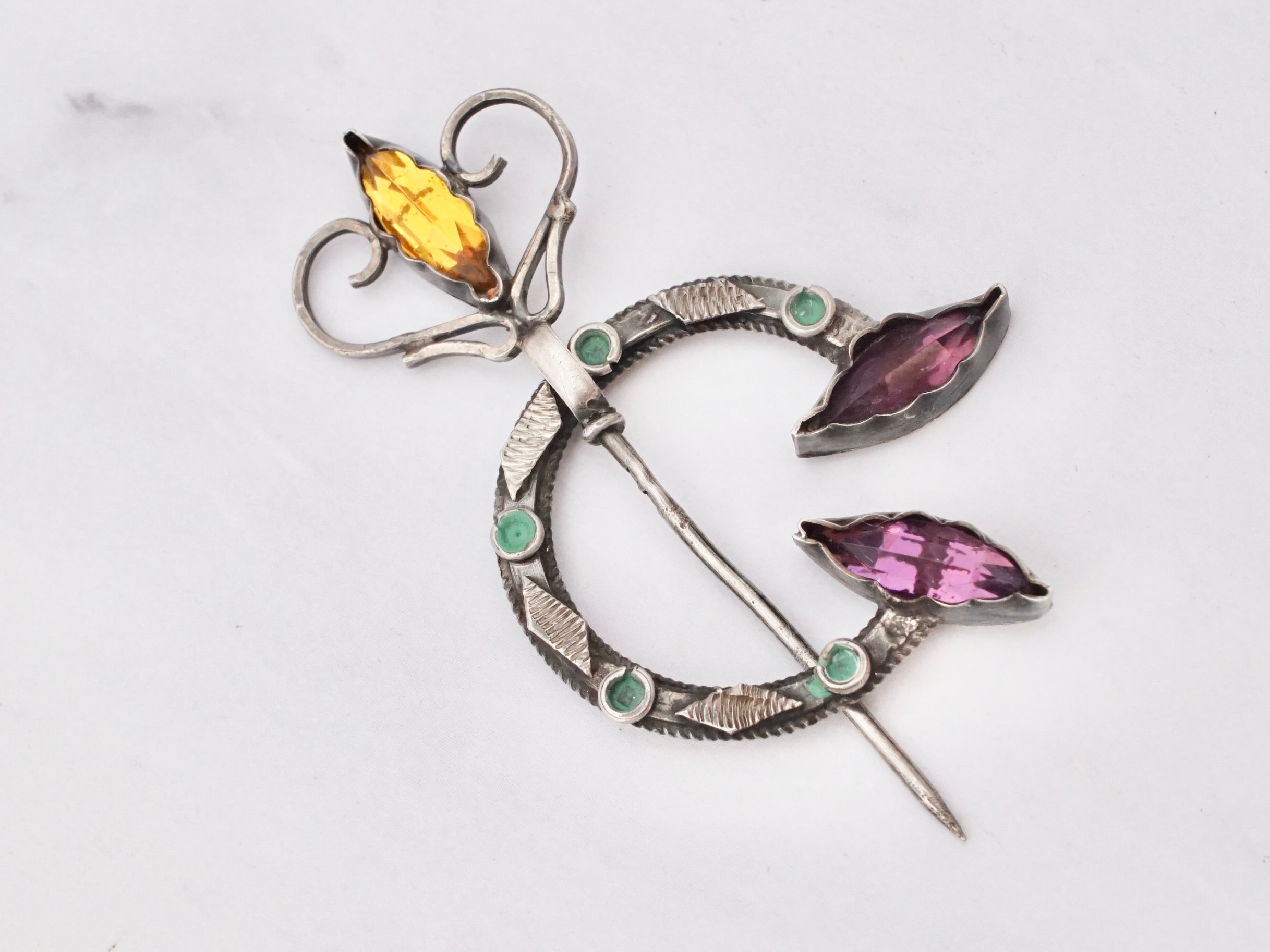 Antique Celtic silver, glass gem, and enamel penannular brooch/cloak pin