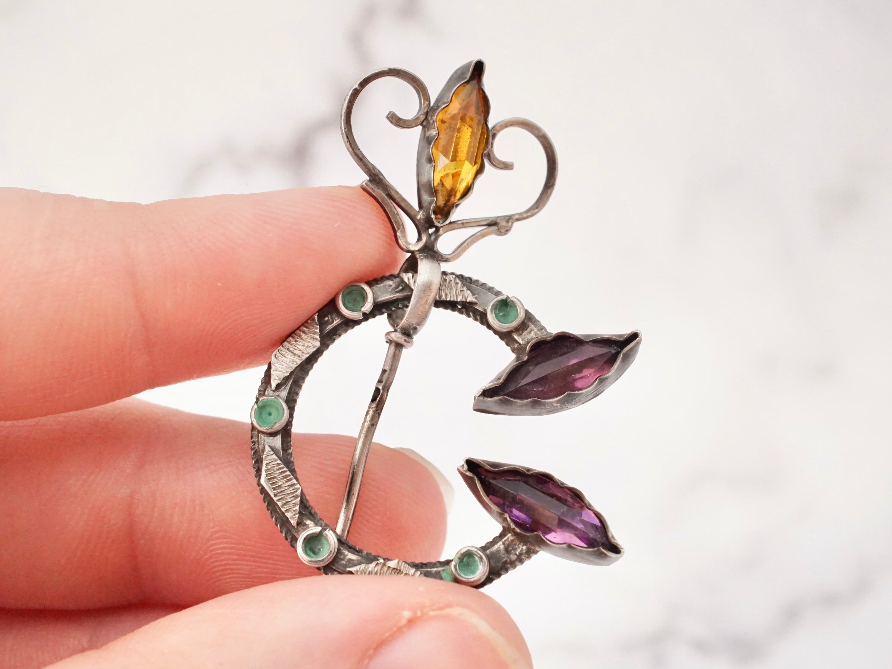 Antique Celtic silver, glass gem, and enamel penannular brooch/cloak pin