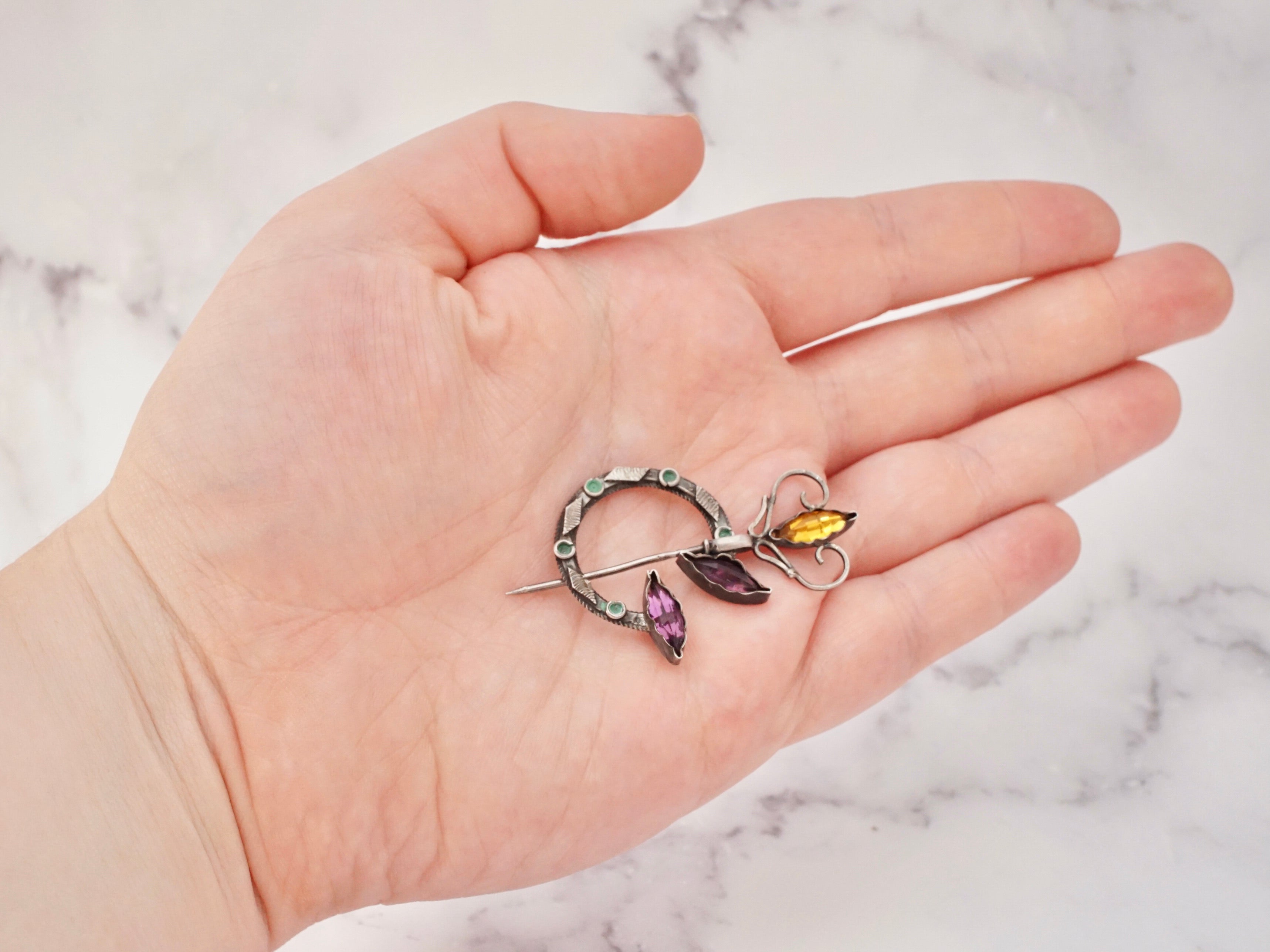 Antique Celtic silver, glass gem, and enamel penannular brooch/cloak pin