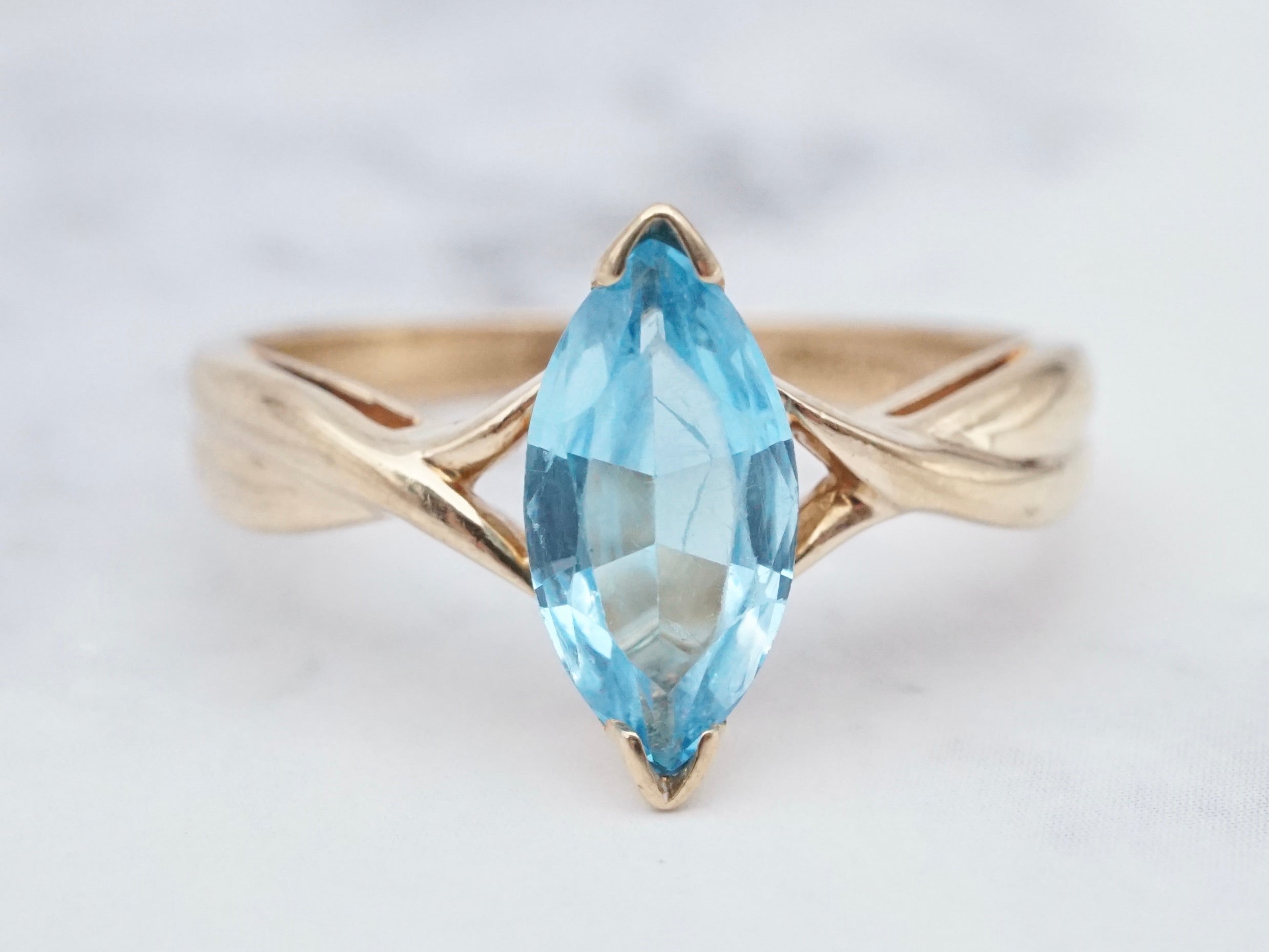 Retro 10k gold and marquise cut blue topaz ring, size 7