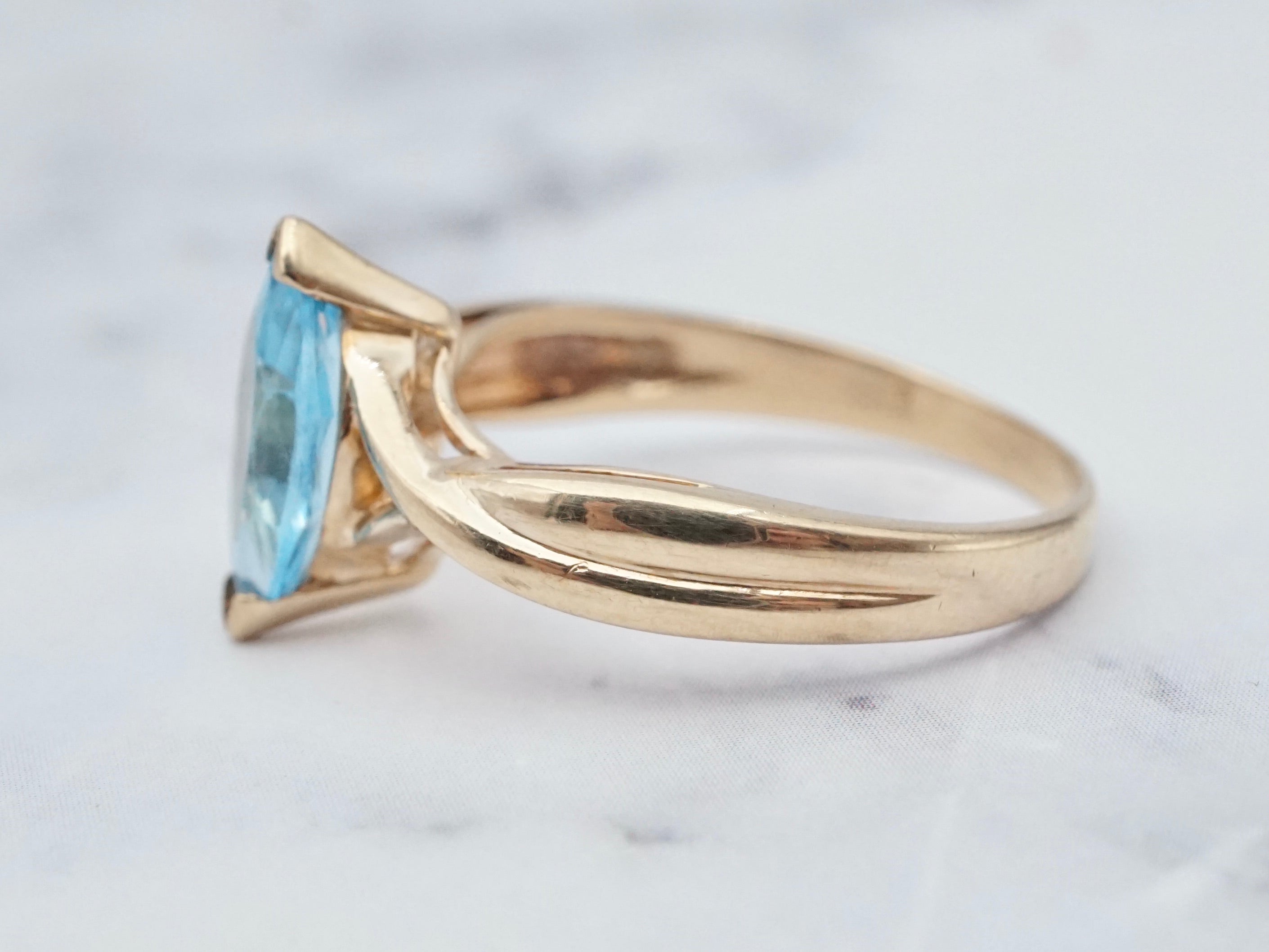 Retro 10k gold and marquise cut blue topaz ring, size 7
