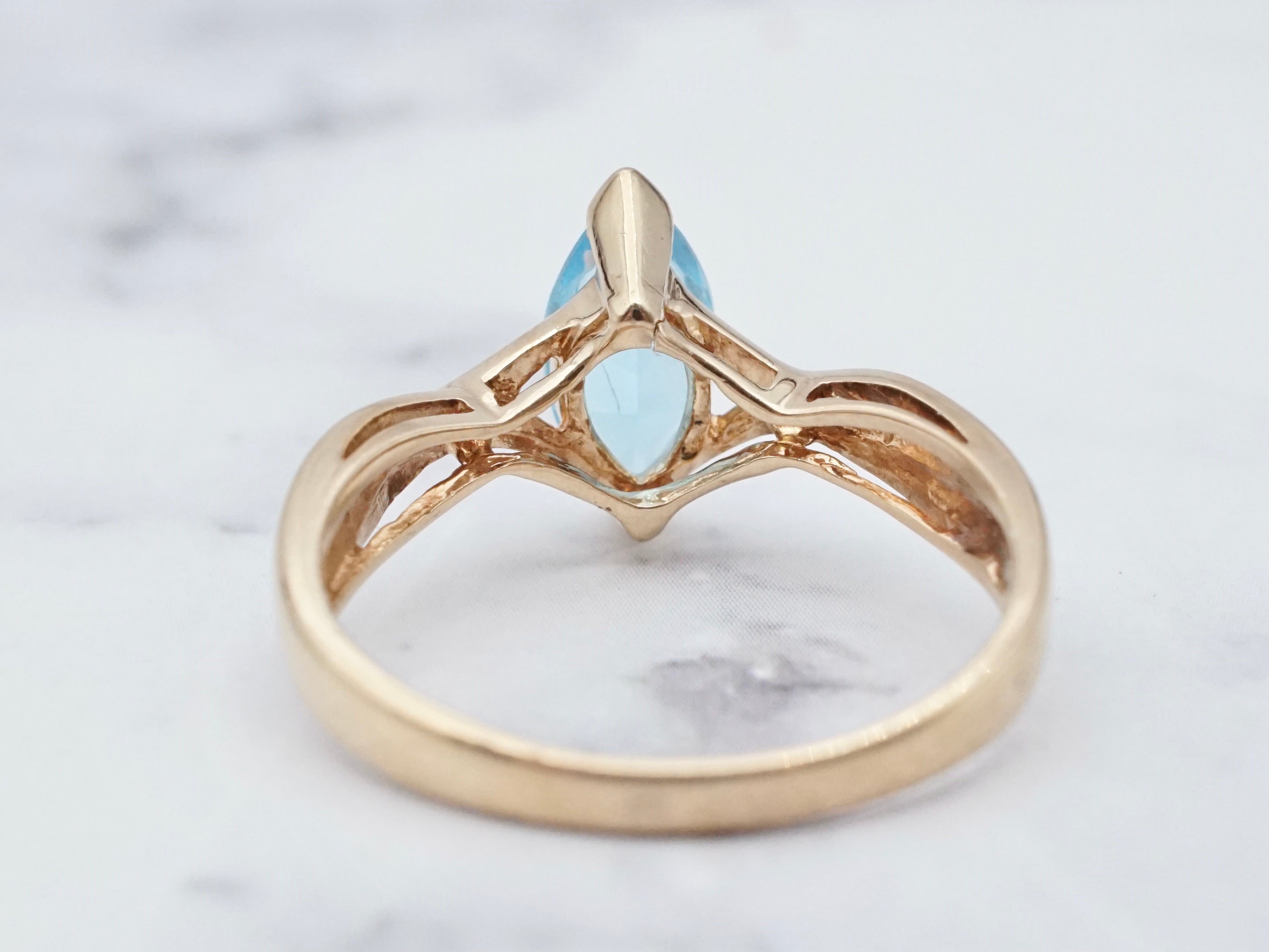 Retro 10k gold and marquise cut blue topaz ring, size 7