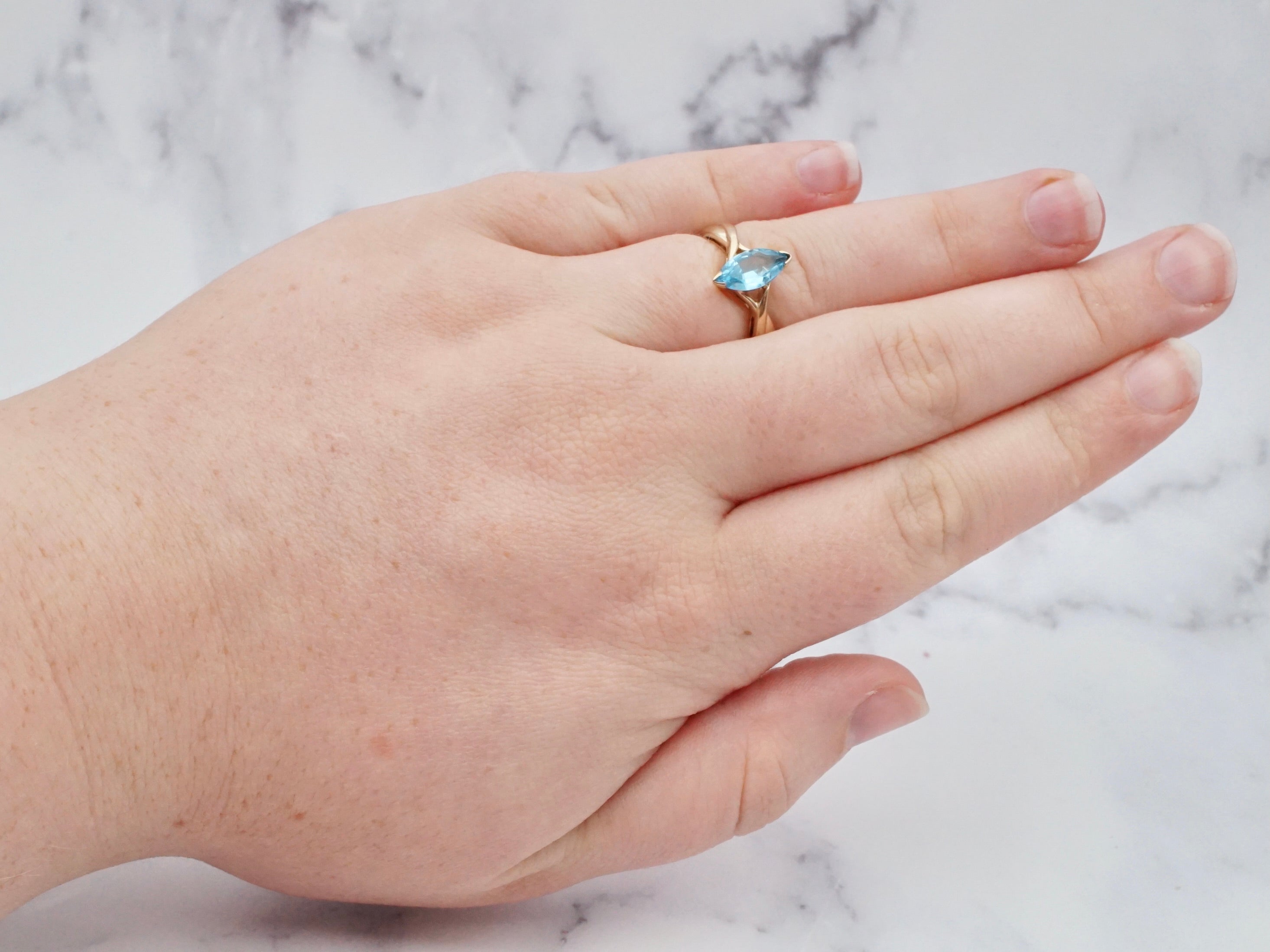Retro 10k gold and marquise cut blue topaz ring, size 7