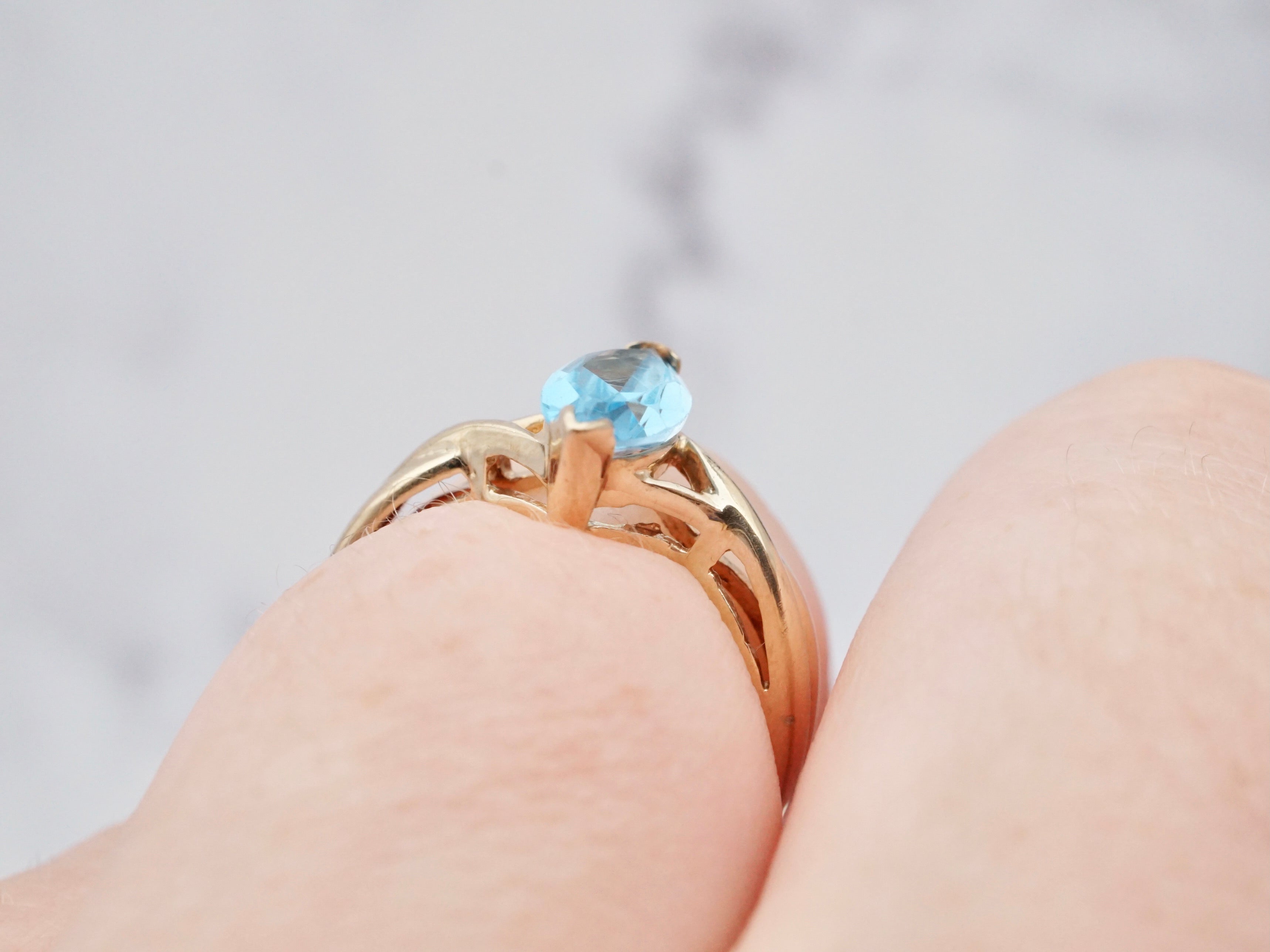 Retro 10k gold and marquise cut blue topaz ring, size 7