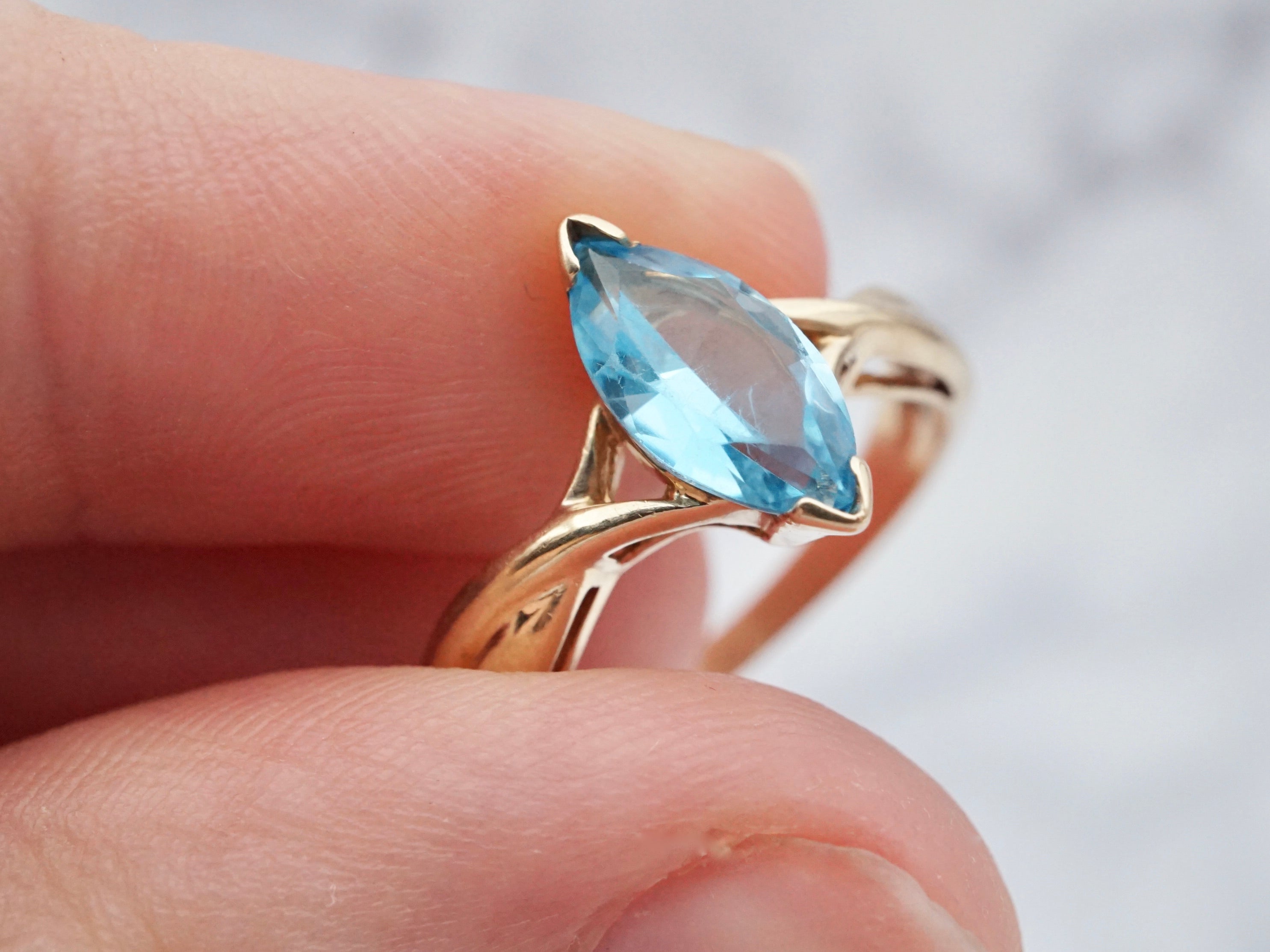 Retro 10k gold and marquise cut blue topaz ring, size 7