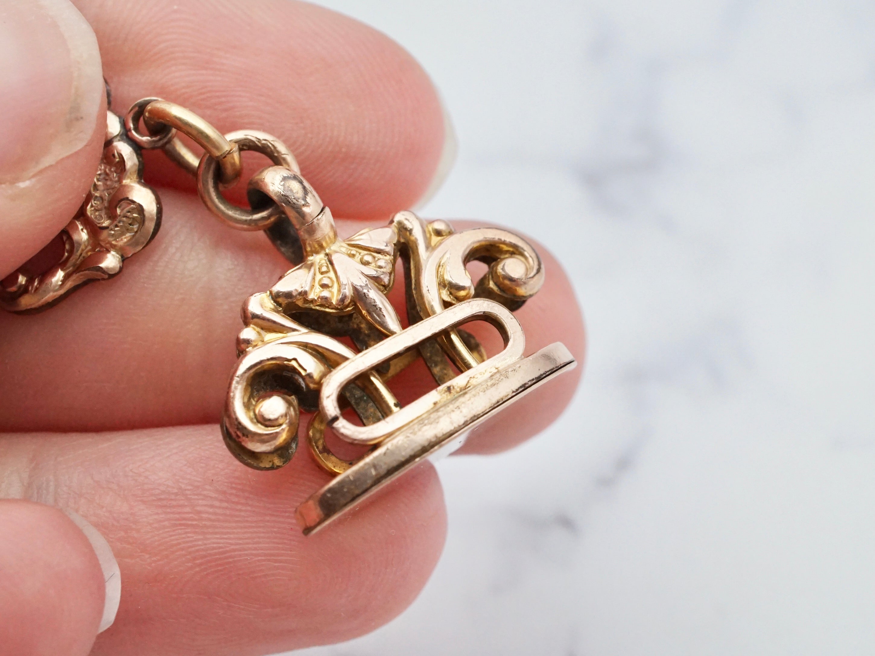 Antique Victorian gold filled long drop watch fob and chain with ruby paste and dog clip