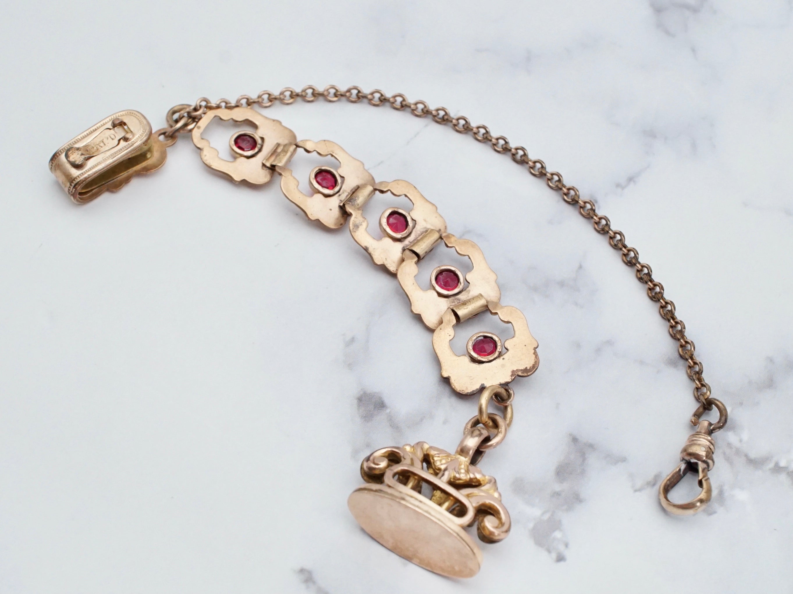 Antique Victorian gold filled long drop watch fob and chain with ruby paste and dog clip