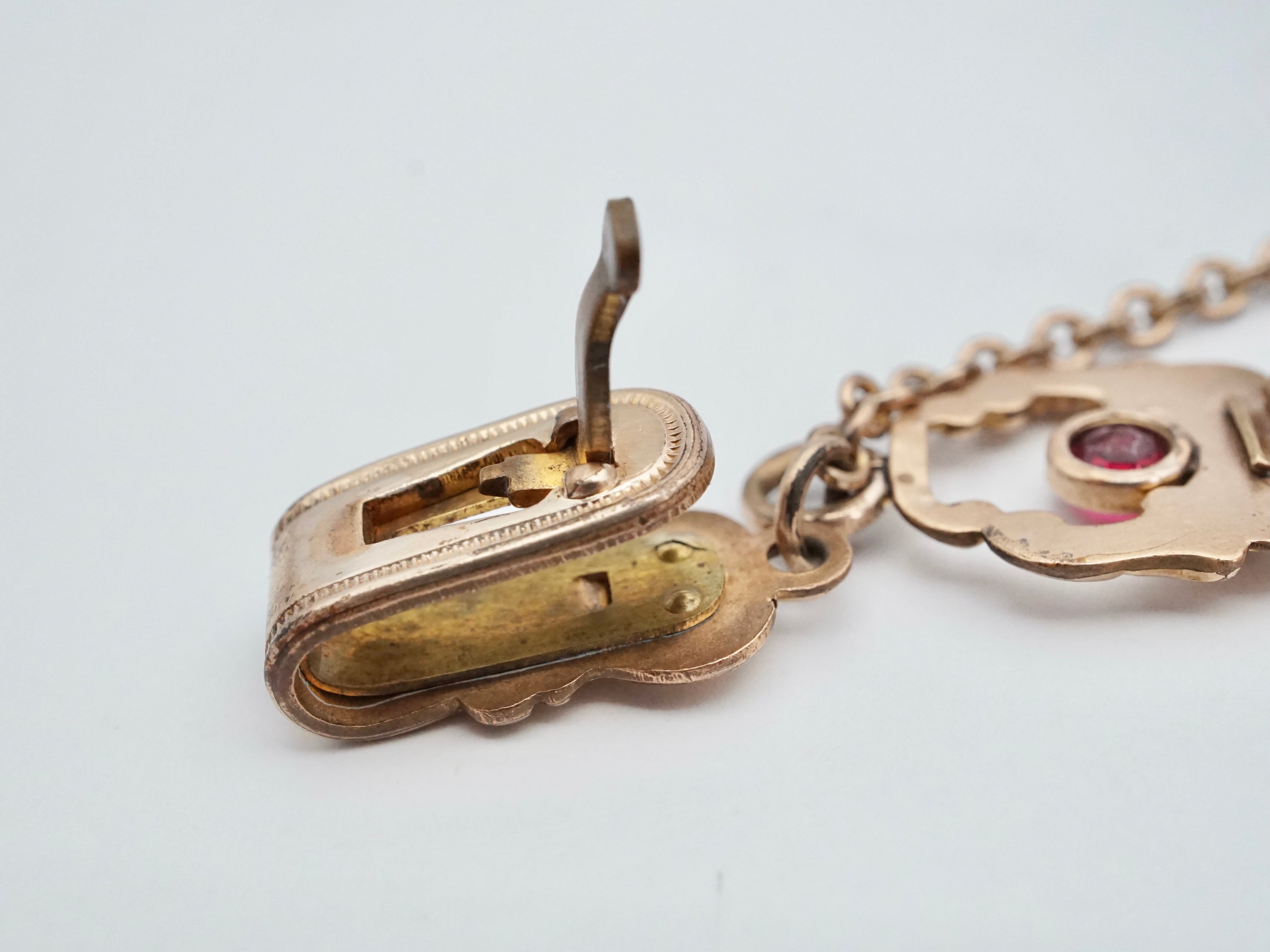 Antique Victorian gold filled long drop watch fob and chain with ruby paste and dog clip