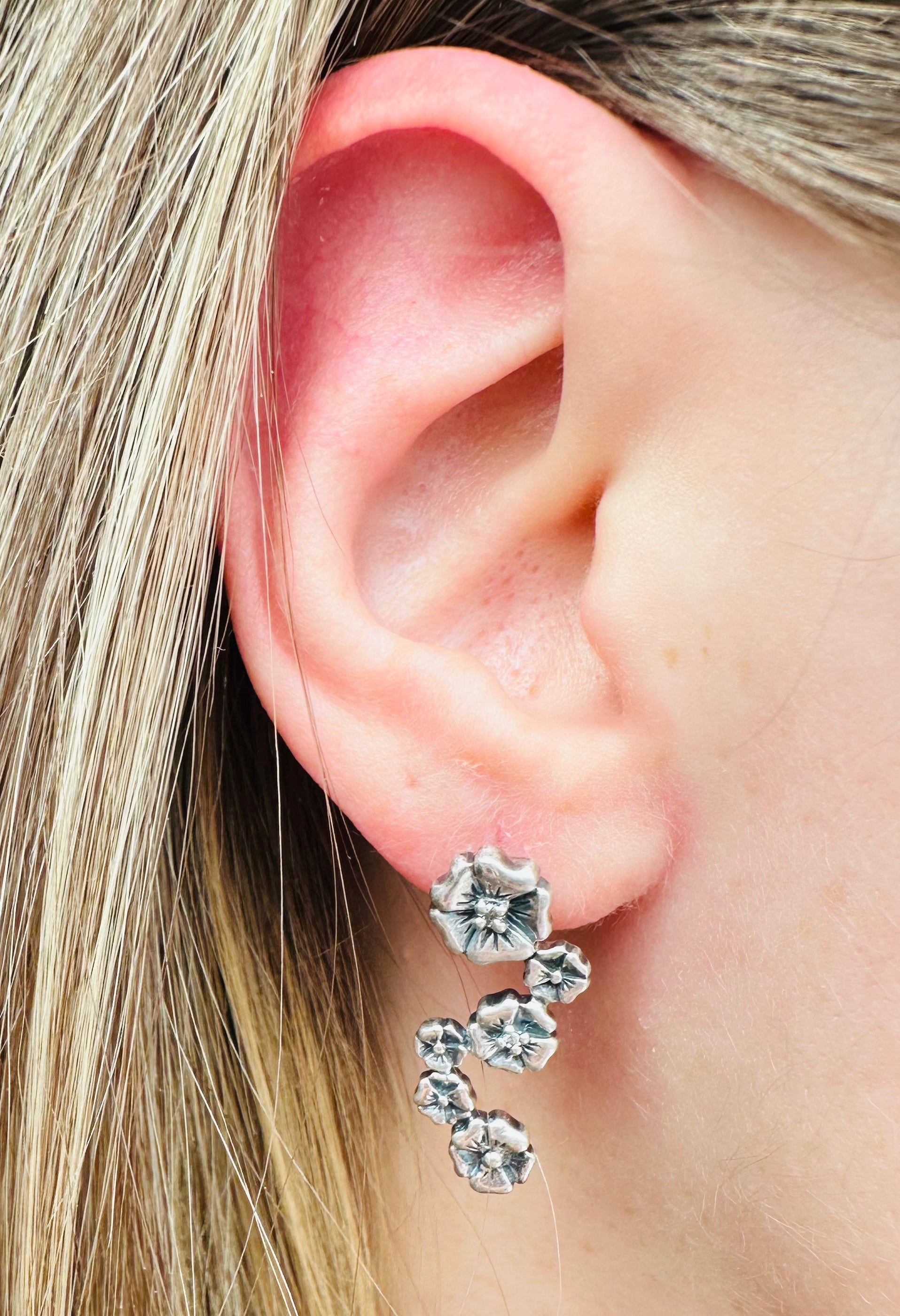 Vintage sterling & diamond flower earrings by “Lyric”