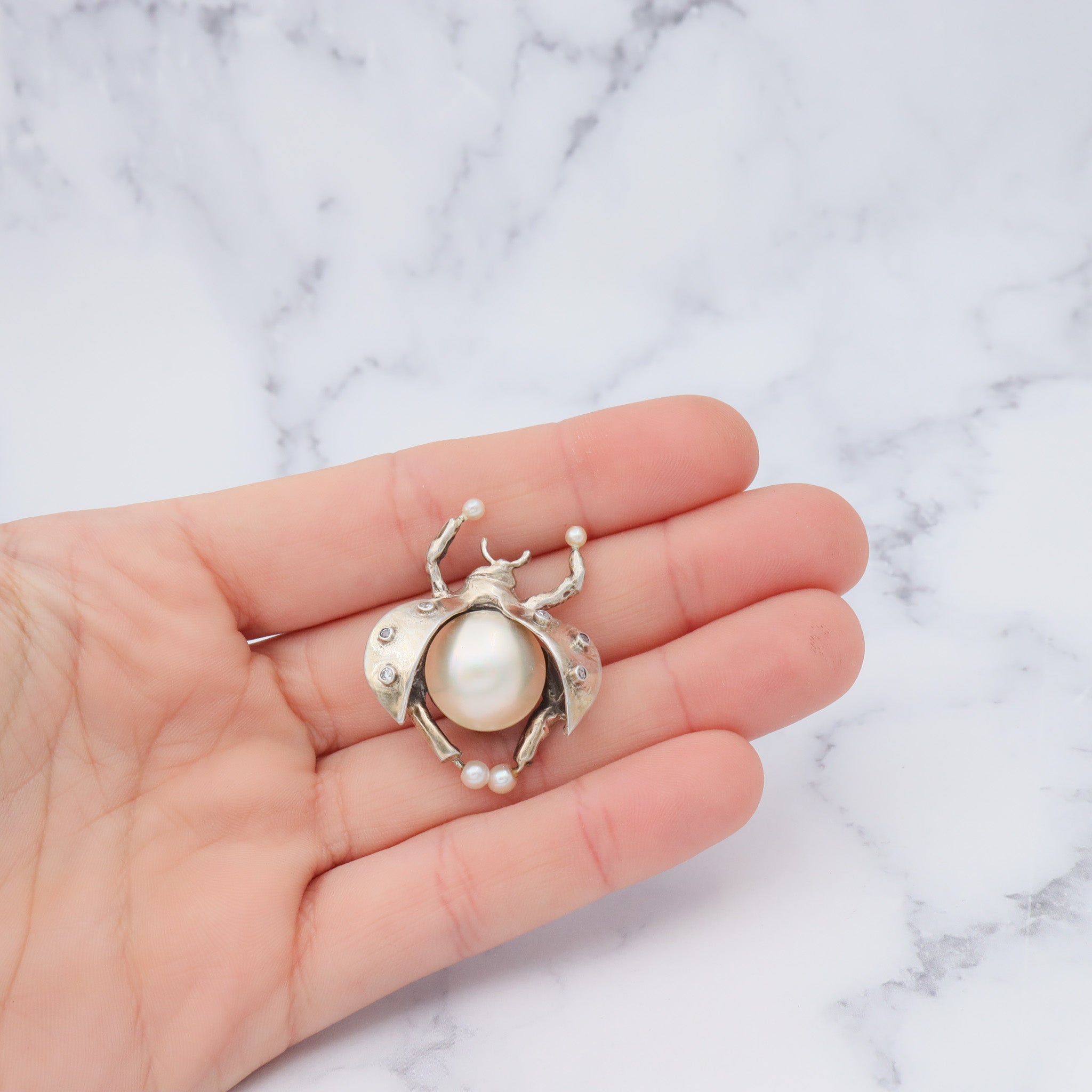 Vintage handmade gilt sterling brooch with mabe pearl & cubic zirconia