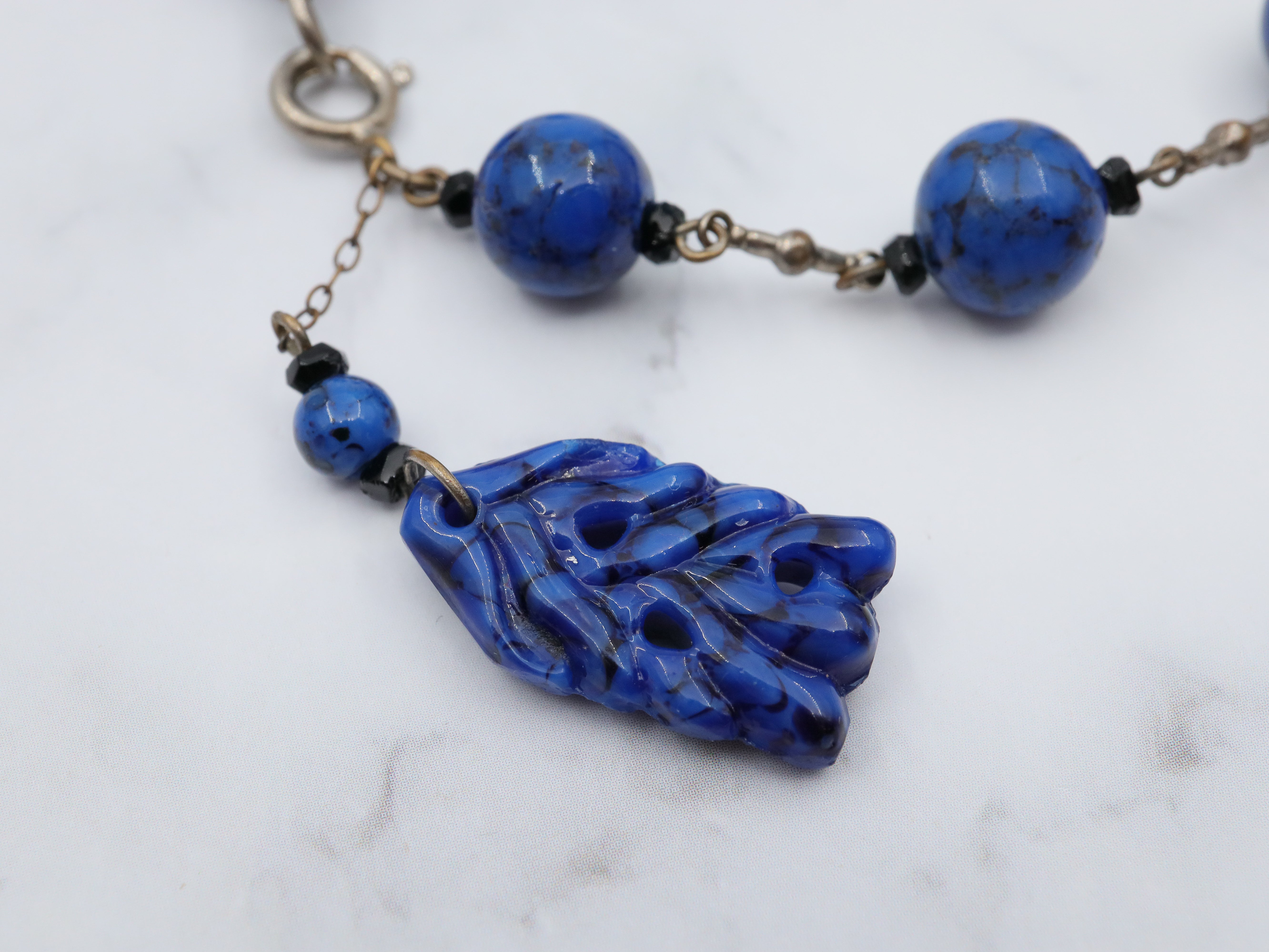 Antique Art Deco silver tone and carved lapis art glass drop bracelet