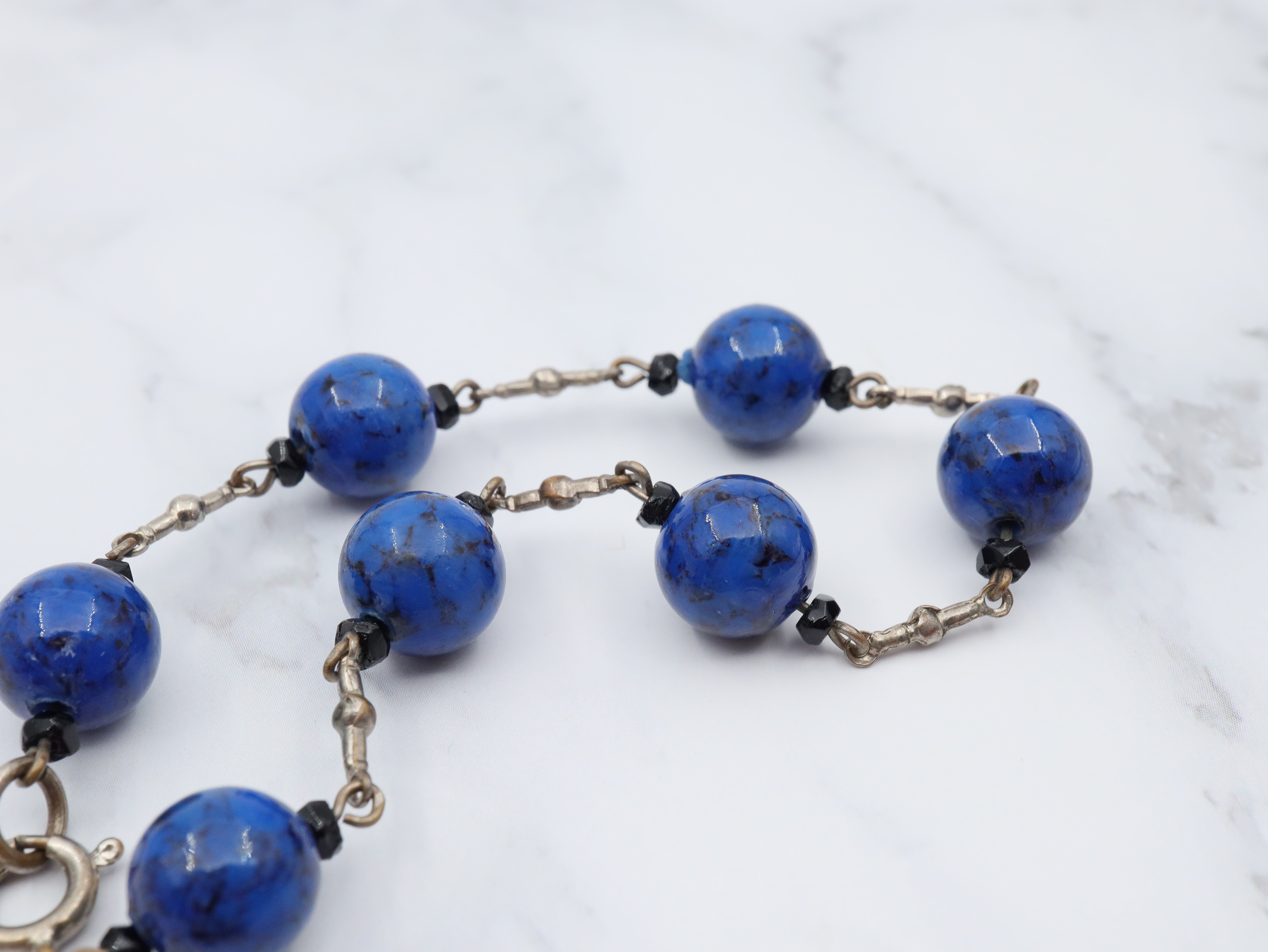 Antique Art Deco silver tone and carved lapis art glass drop bracelet