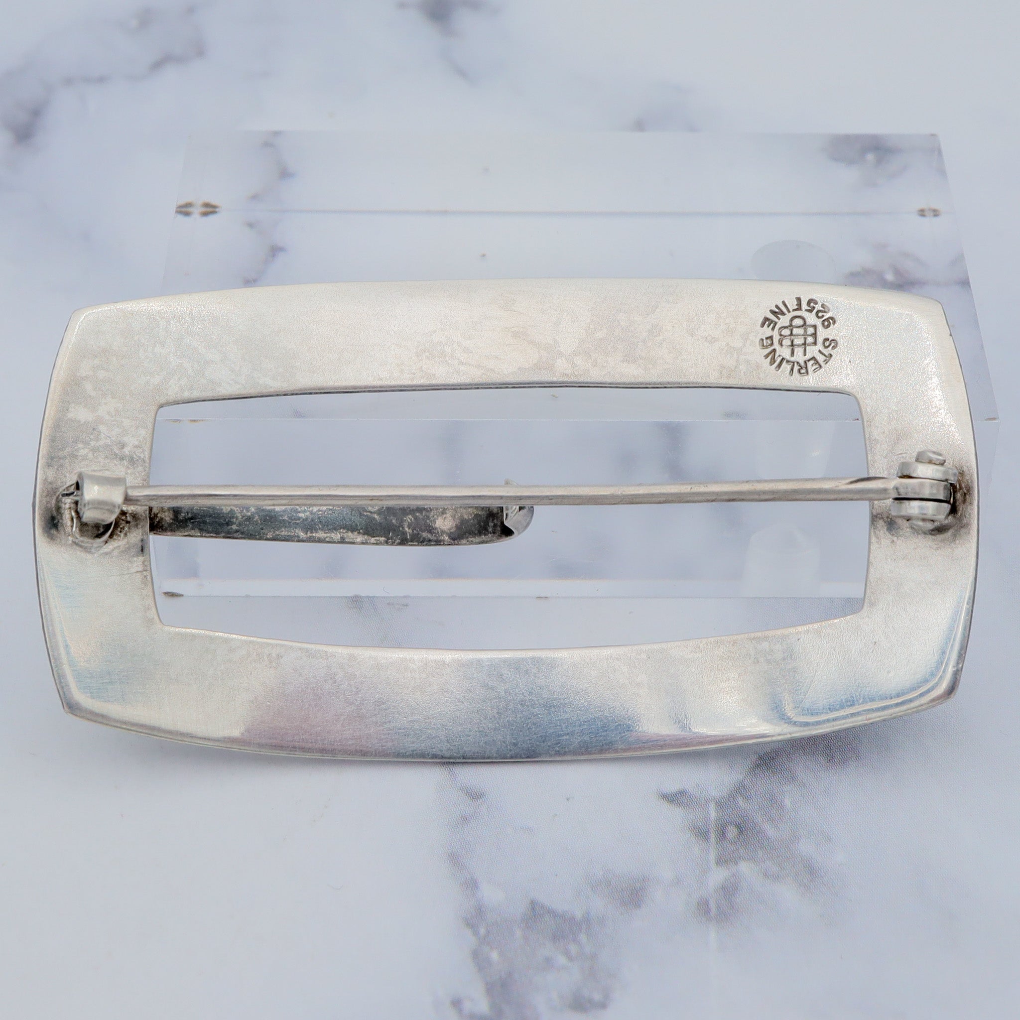 Pair of Antique bright cut engraved sterling Unger Brothers buckle brooches