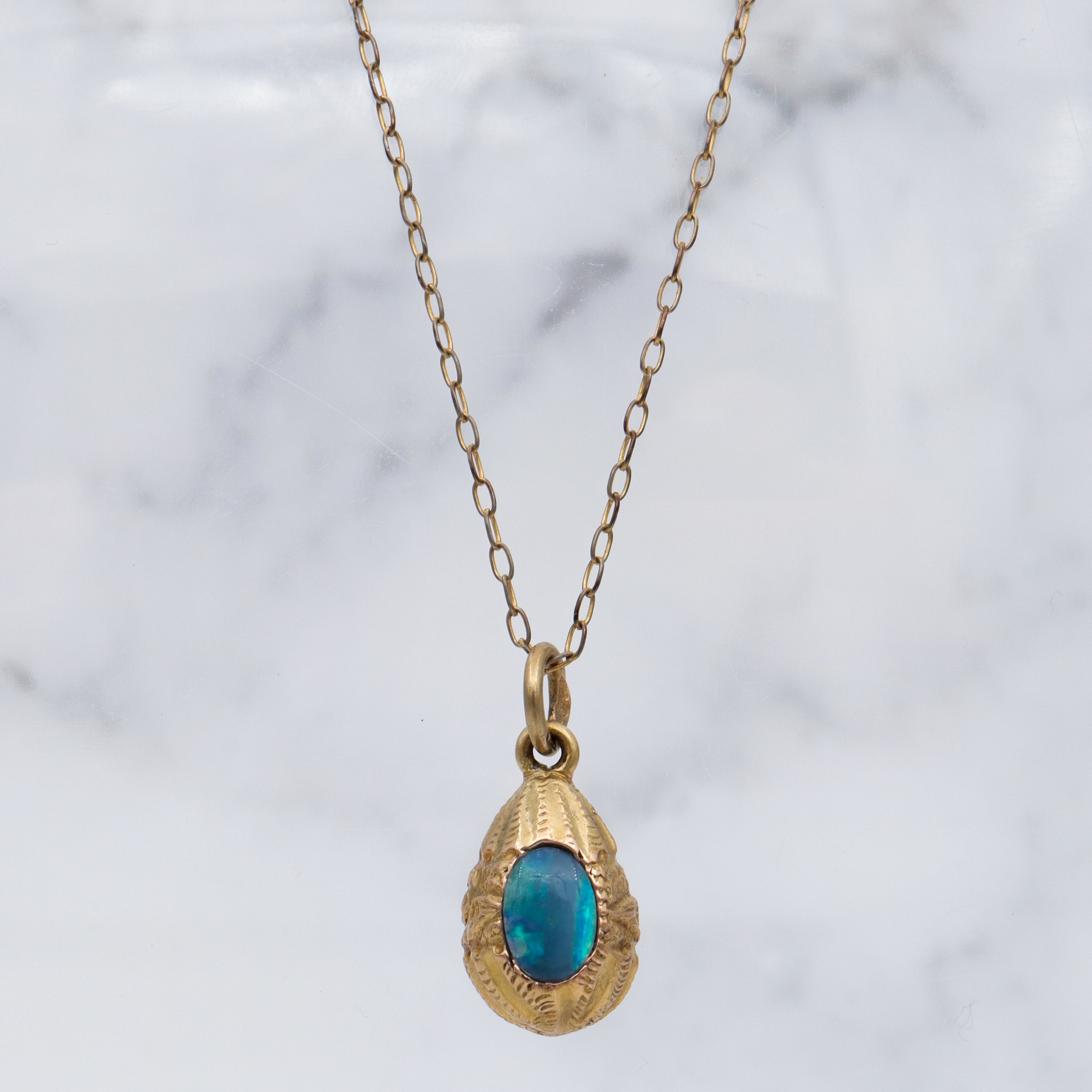 Antique Victorian Russian 14k gold & black opal triplet egg pendant