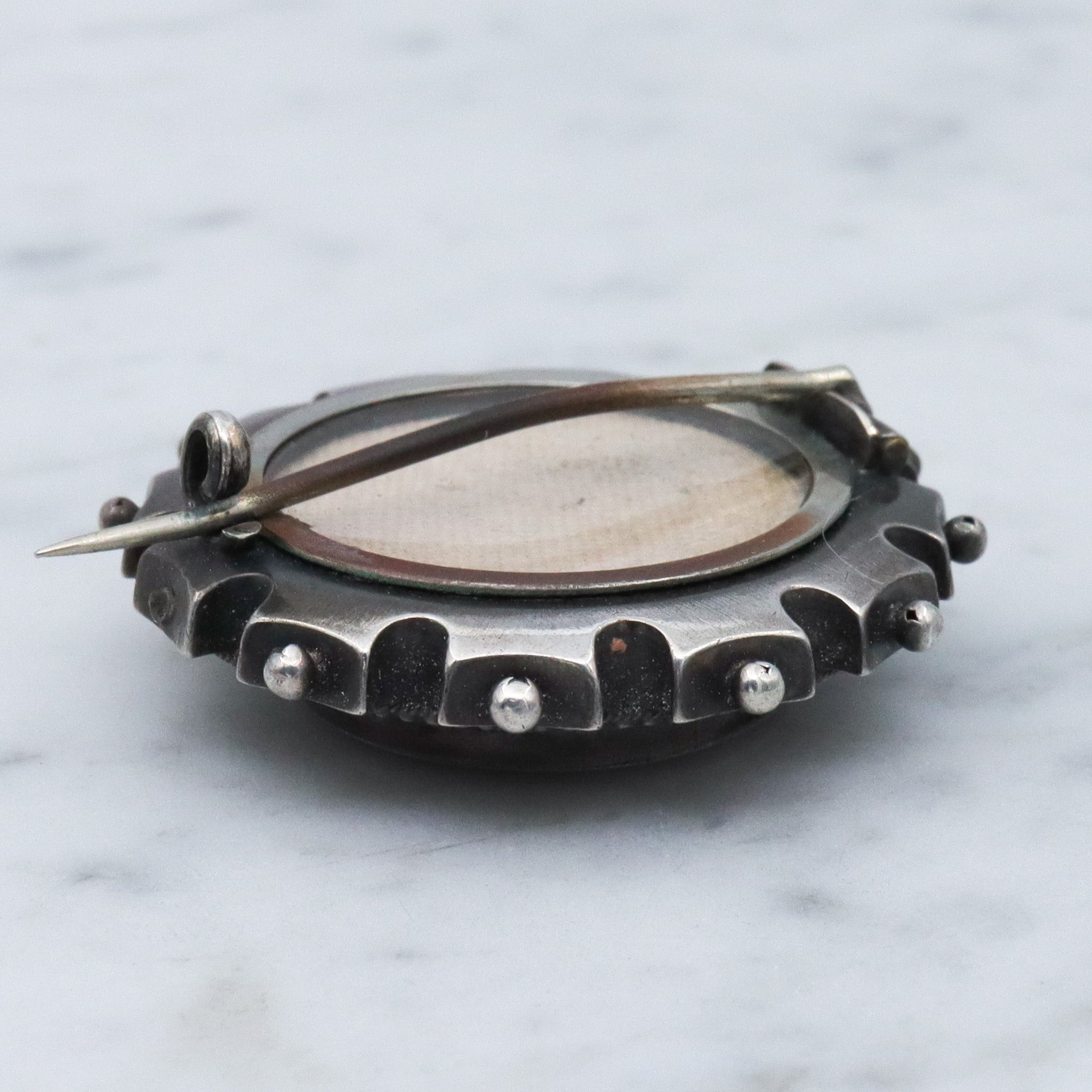 Antique Aesthetic sterling silver & enamel brooch with locket back