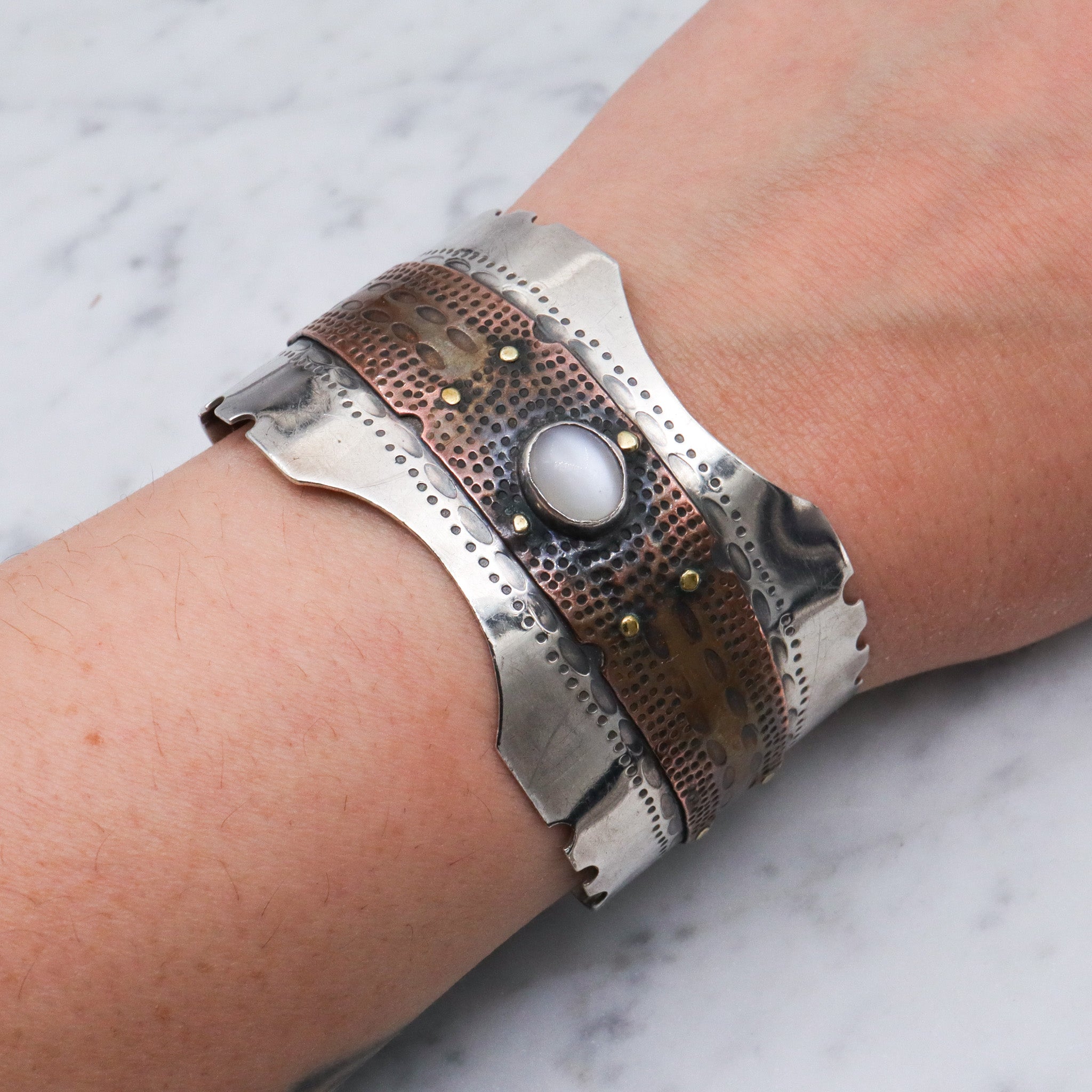 Vintage sterling silver & copper cuff bracelet with cats eye cabochon