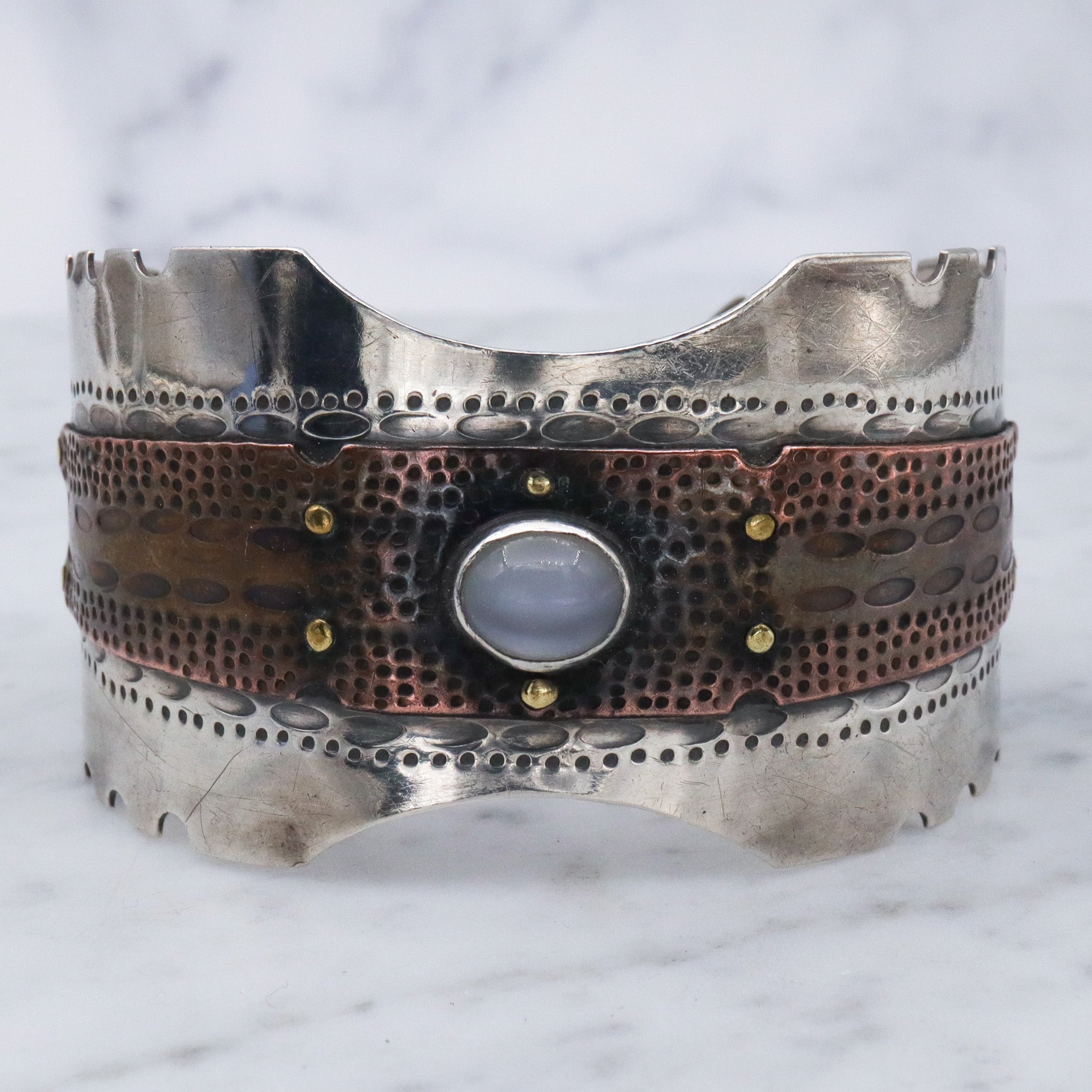 Vintage sterling silver & copper cuff bracelet with cats eye cabochon