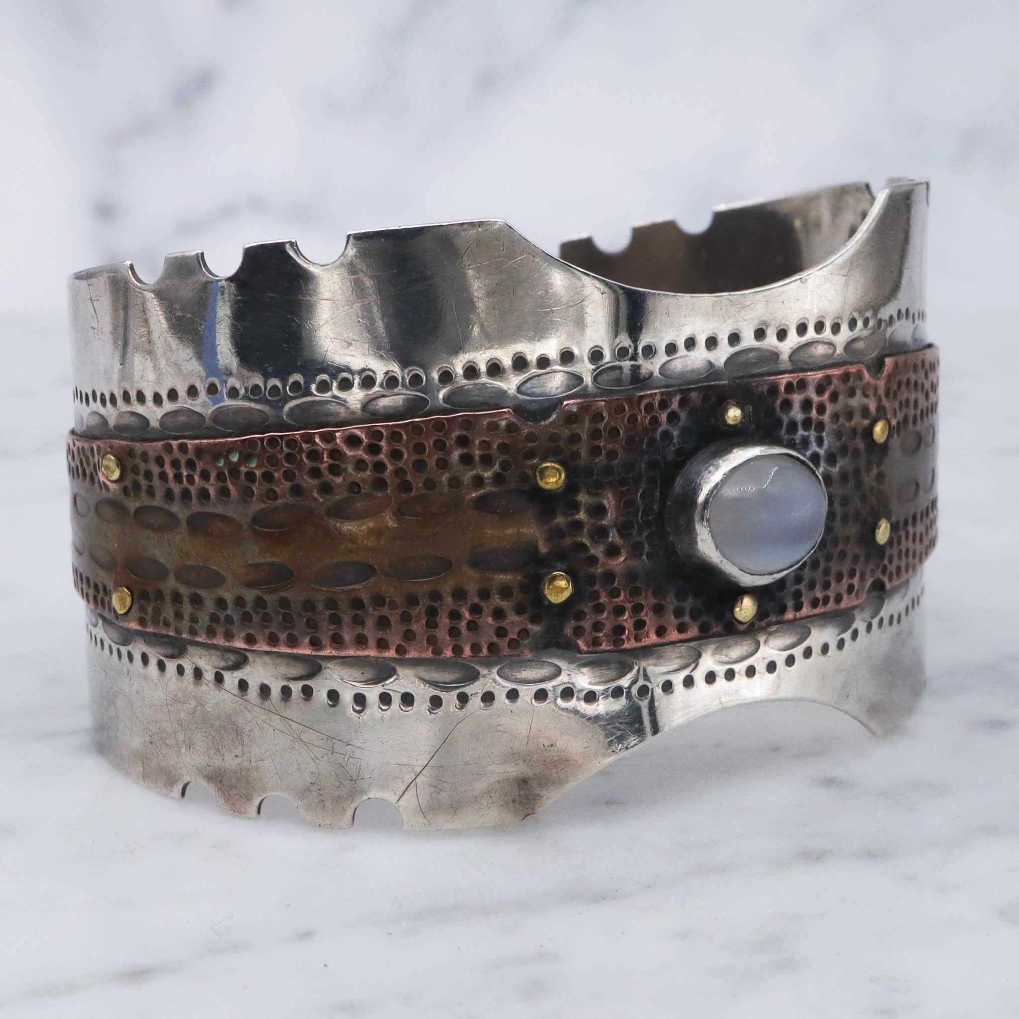Vintage sterling silver & copper cuff bracelet with cats eye cabochon