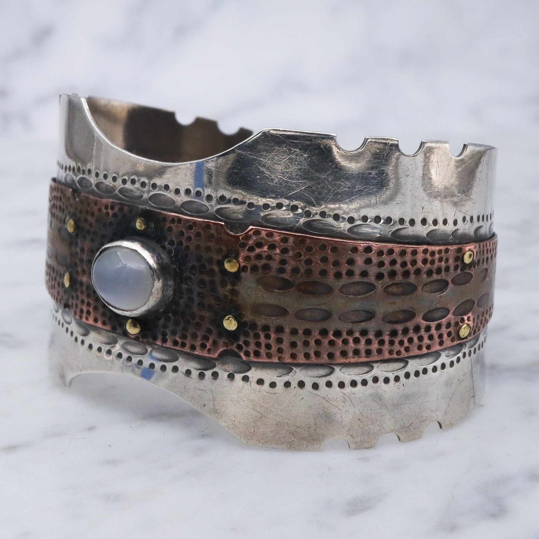 Vintage sterling silver & copper cuff bracelet with cats eye cabochon