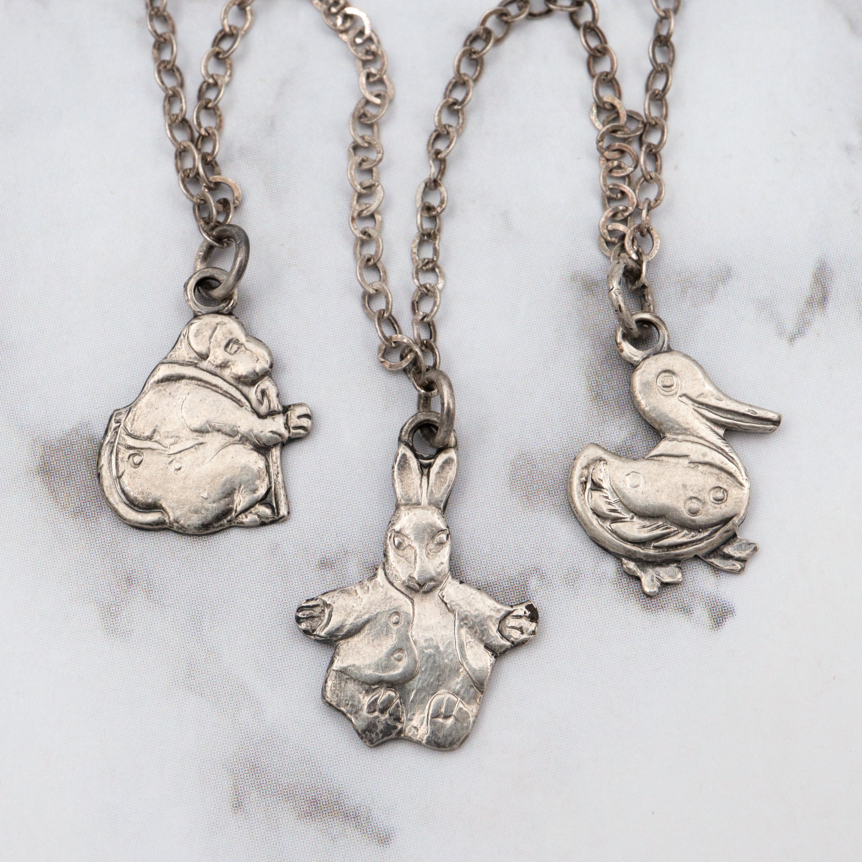 Antique sterling child’s nursery rhyme necklace