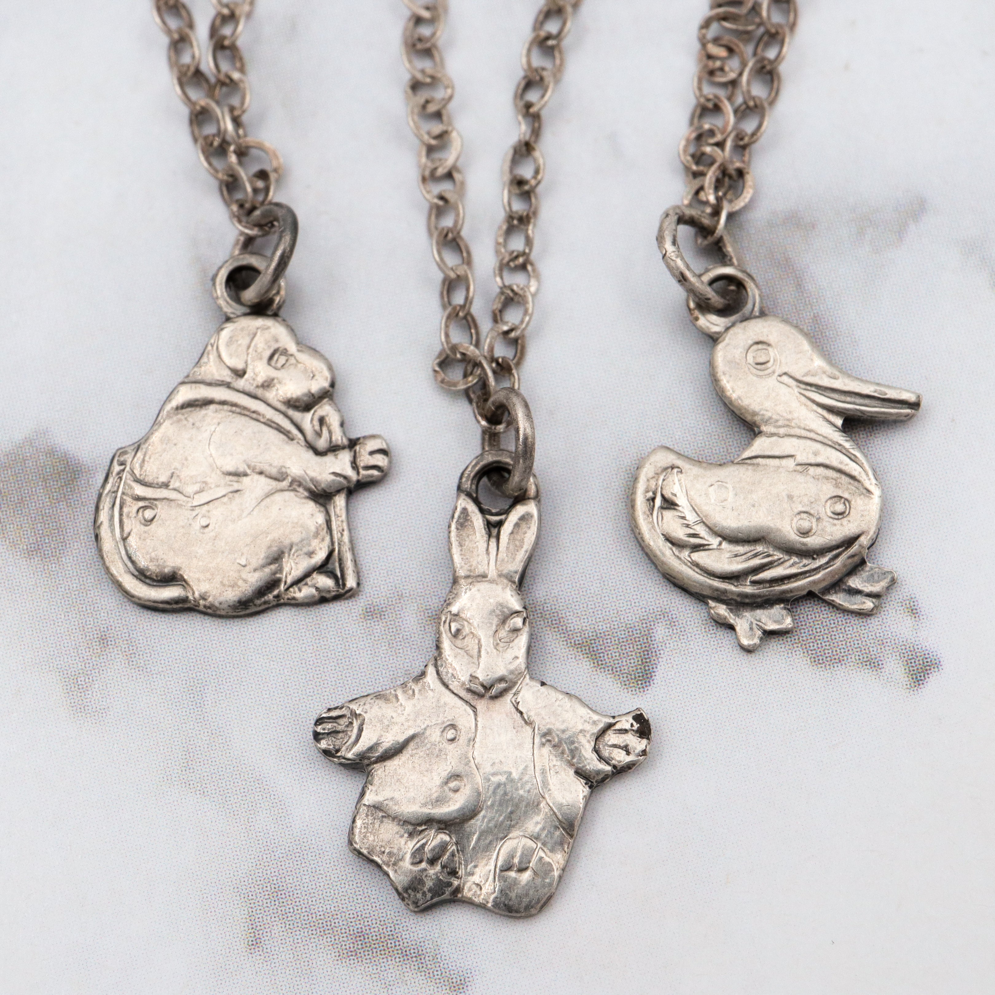 Antique sterling child’s nursery rhyme necklace