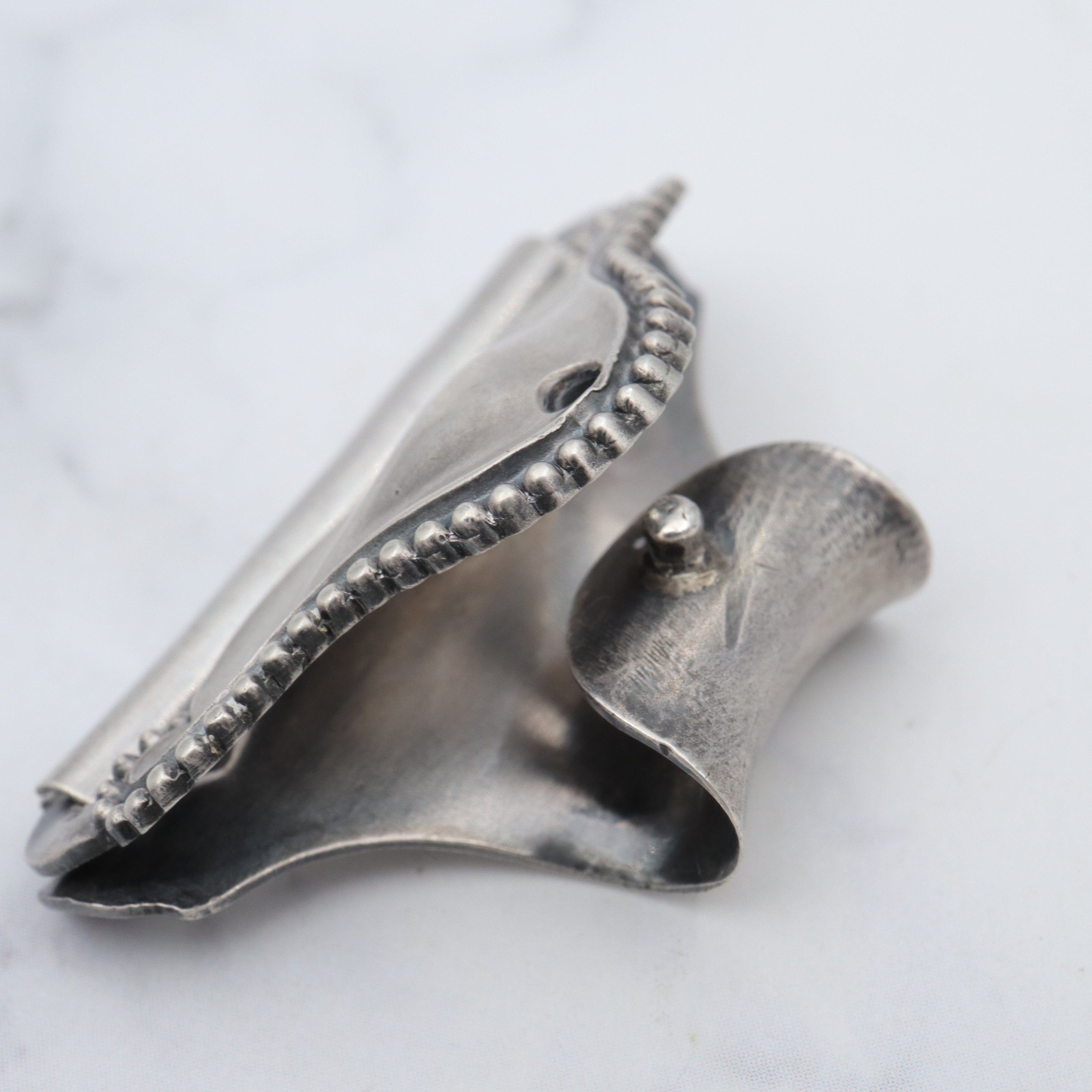 Pair of Antique sterling suspender buckle clips by Sloan & Co.