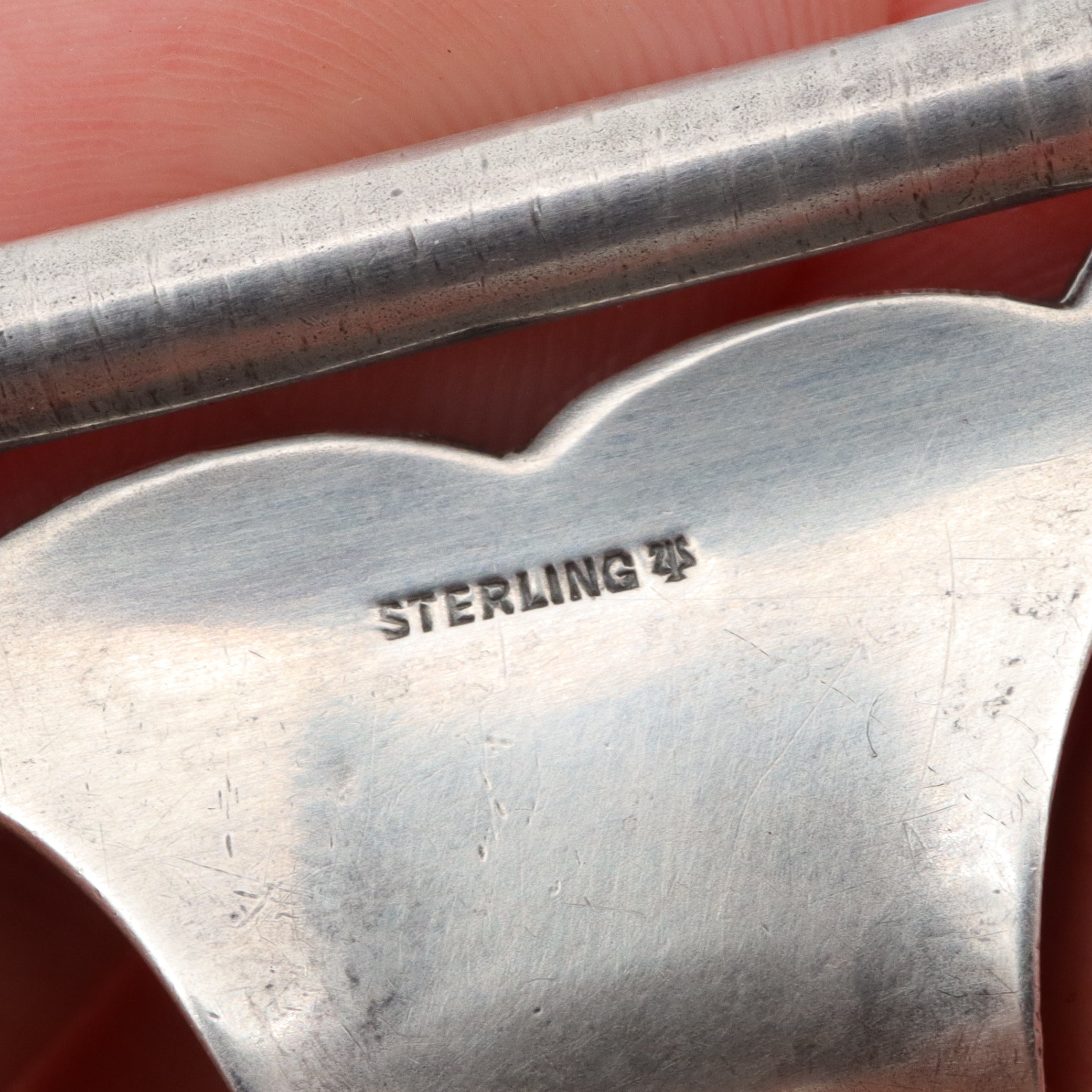 Pair of Antique sterling suspender buckle clips by Sloan & Co.