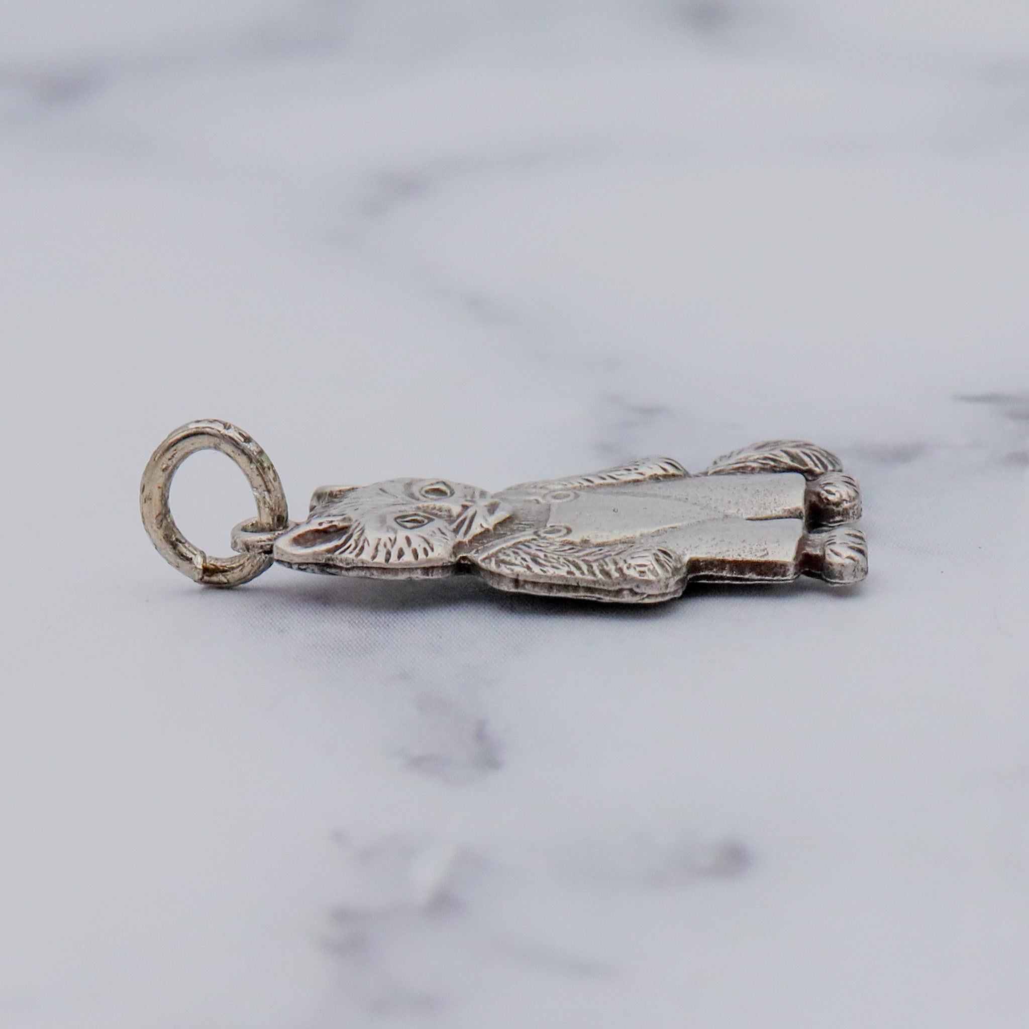 Vintage sterling double sided cat charm