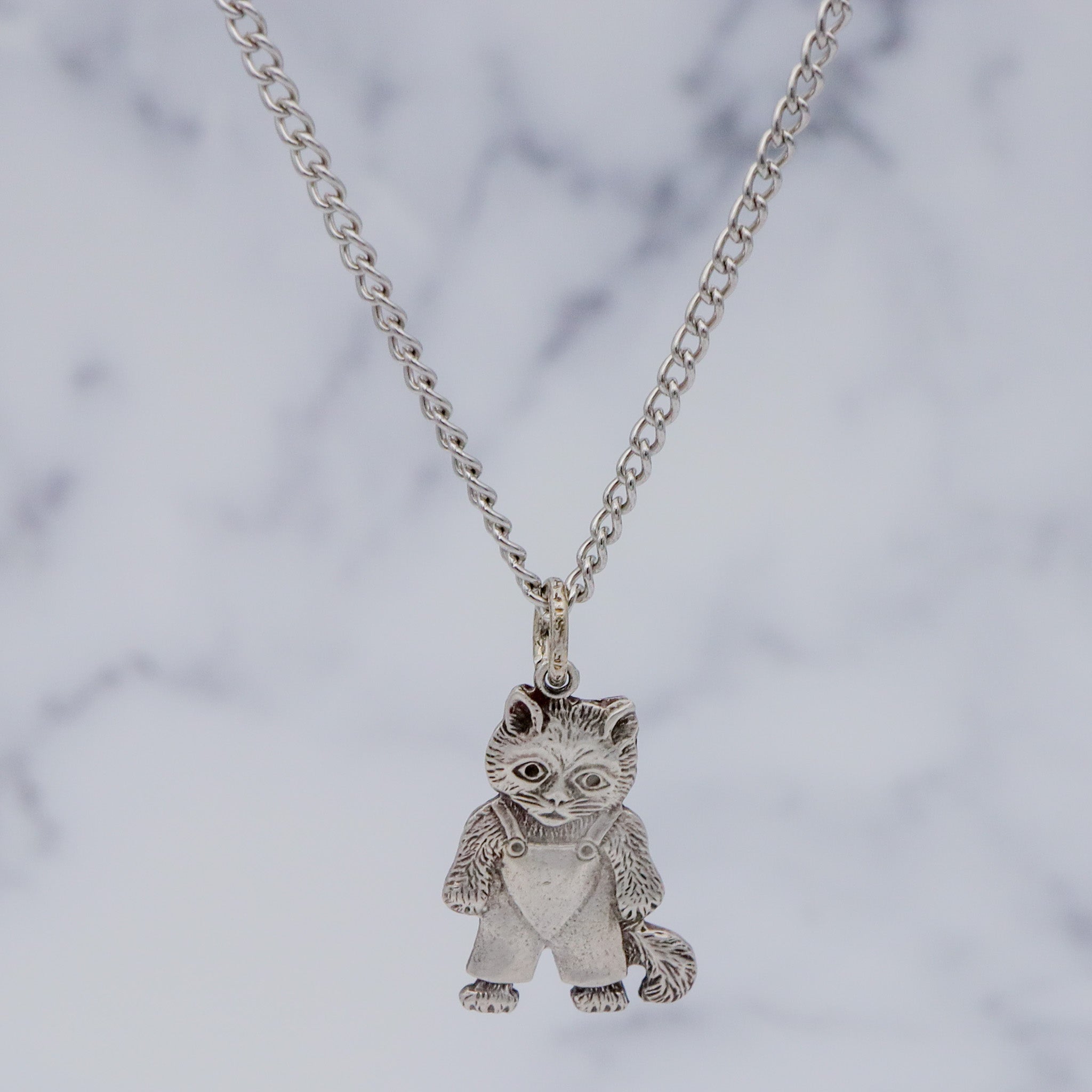 Vintage sterling double sided cat charm