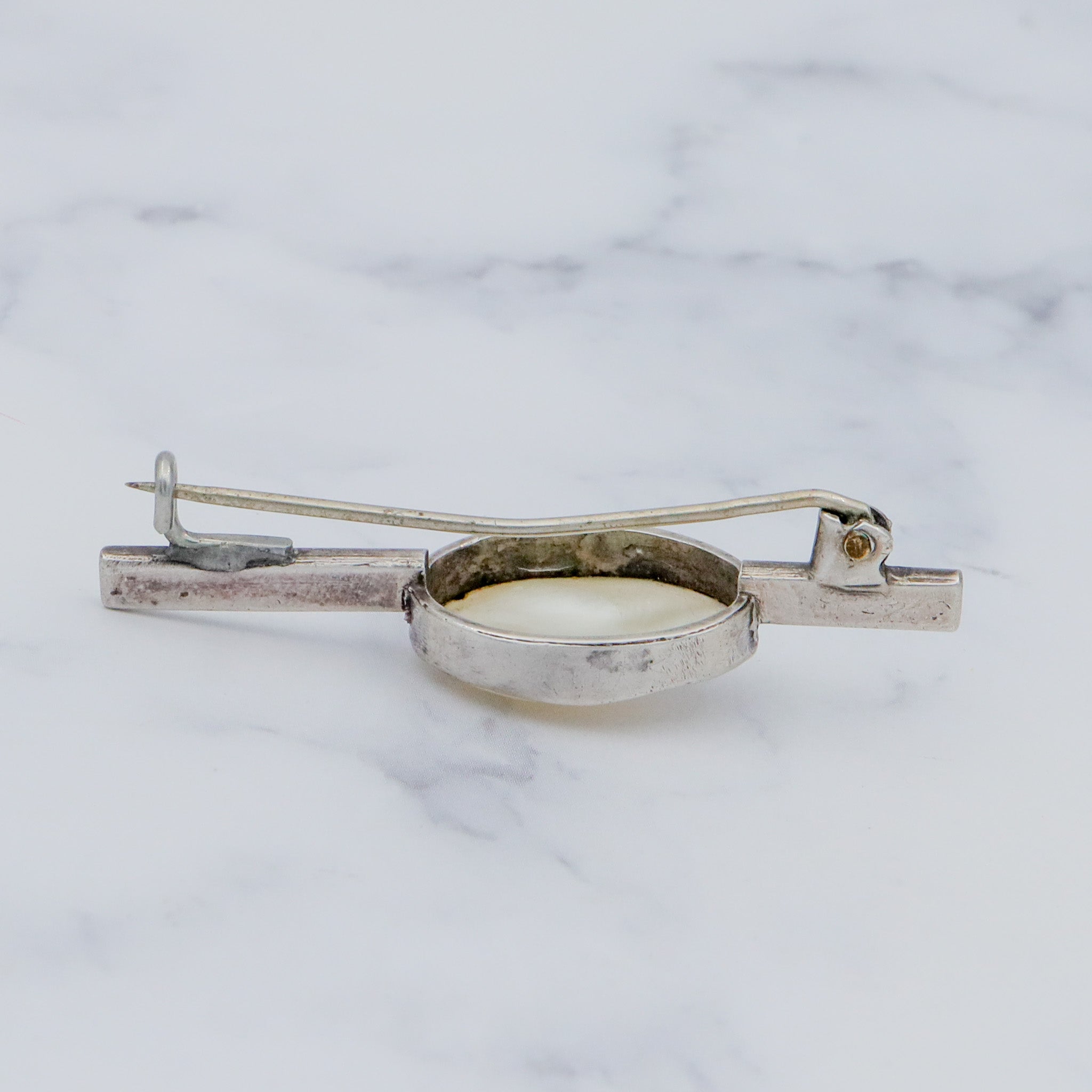 Antique Art Deco sterling & mabe pearl brooch