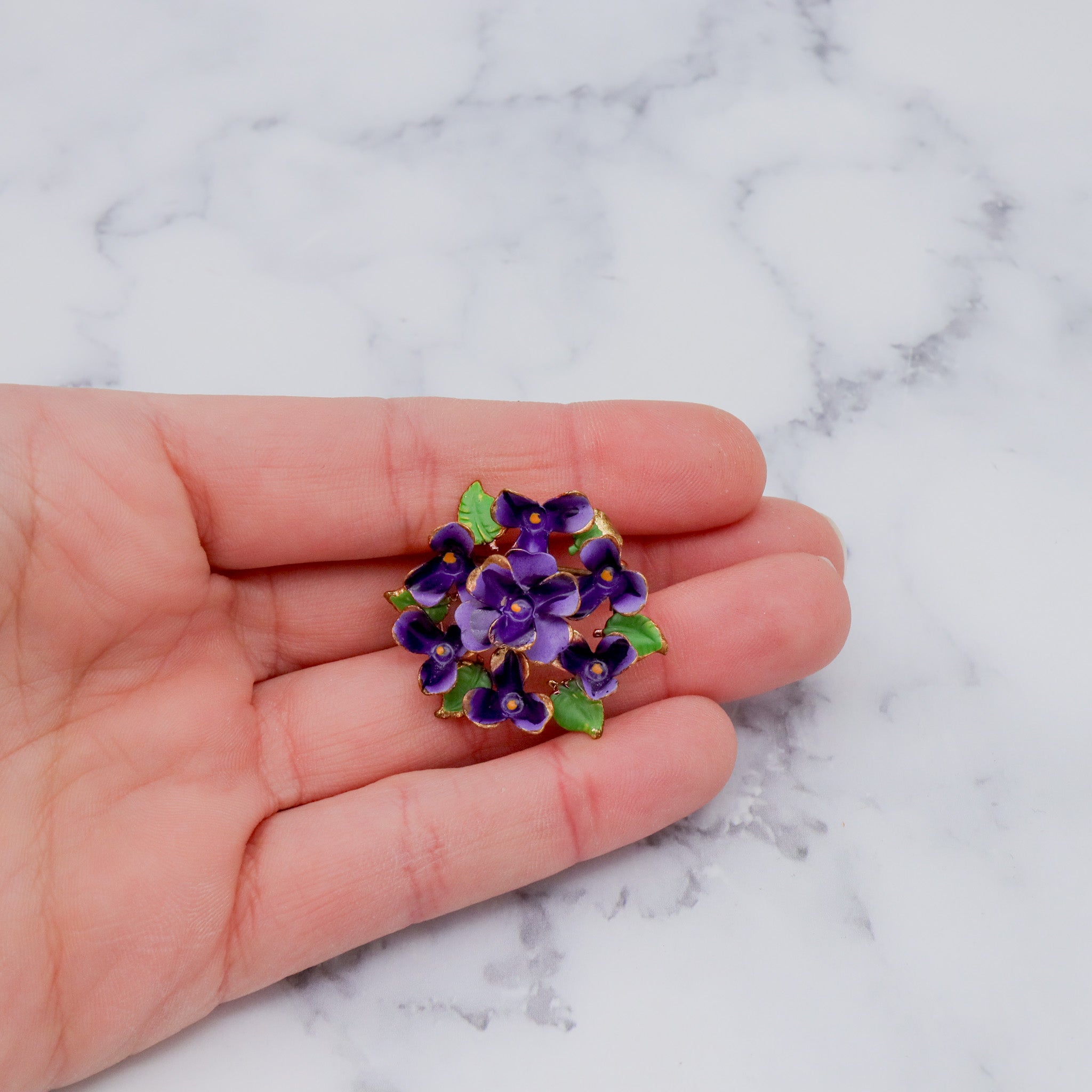 Antique painted brass violets brooch