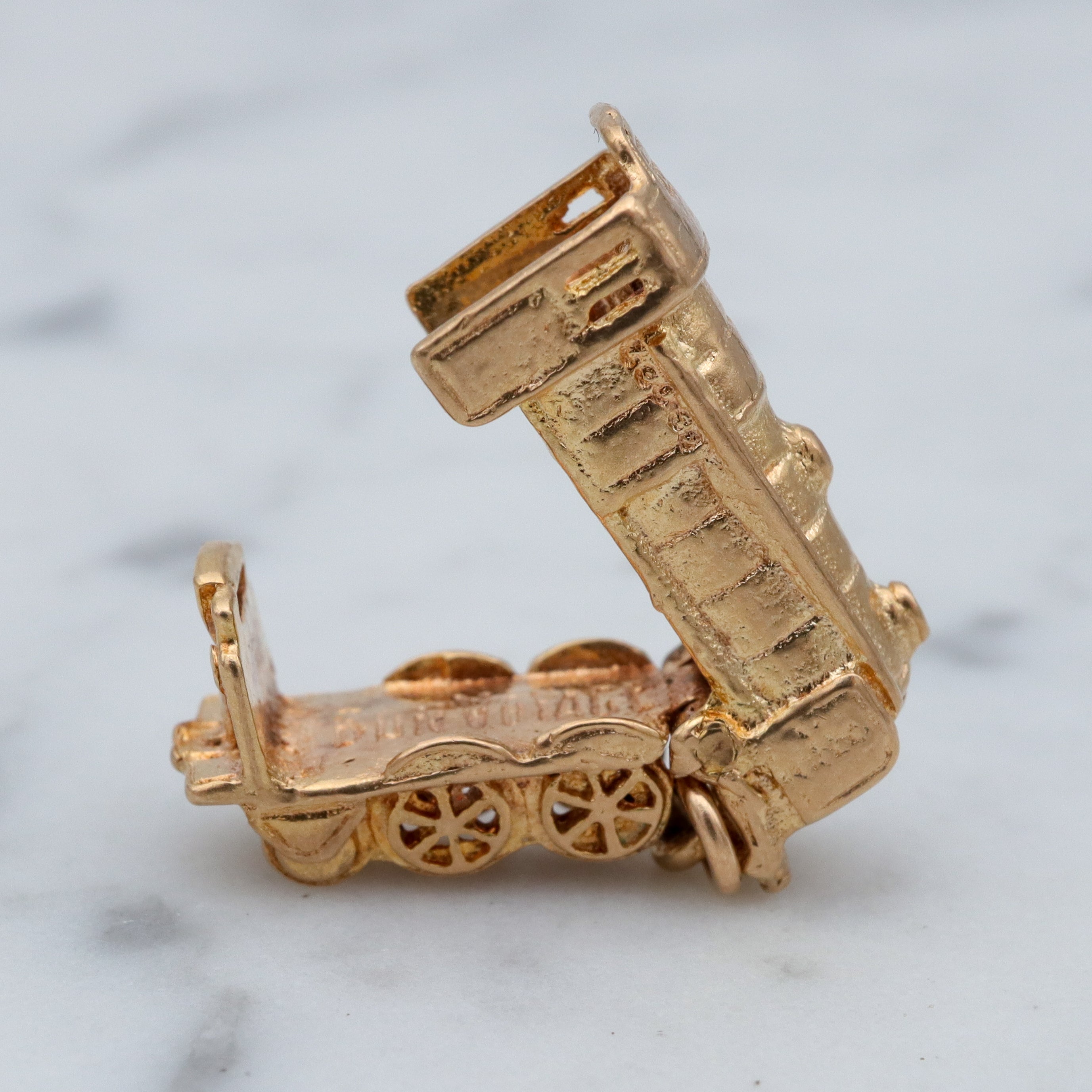 Vintage English 9k gold opening “Bon Voyage” locomotive charm