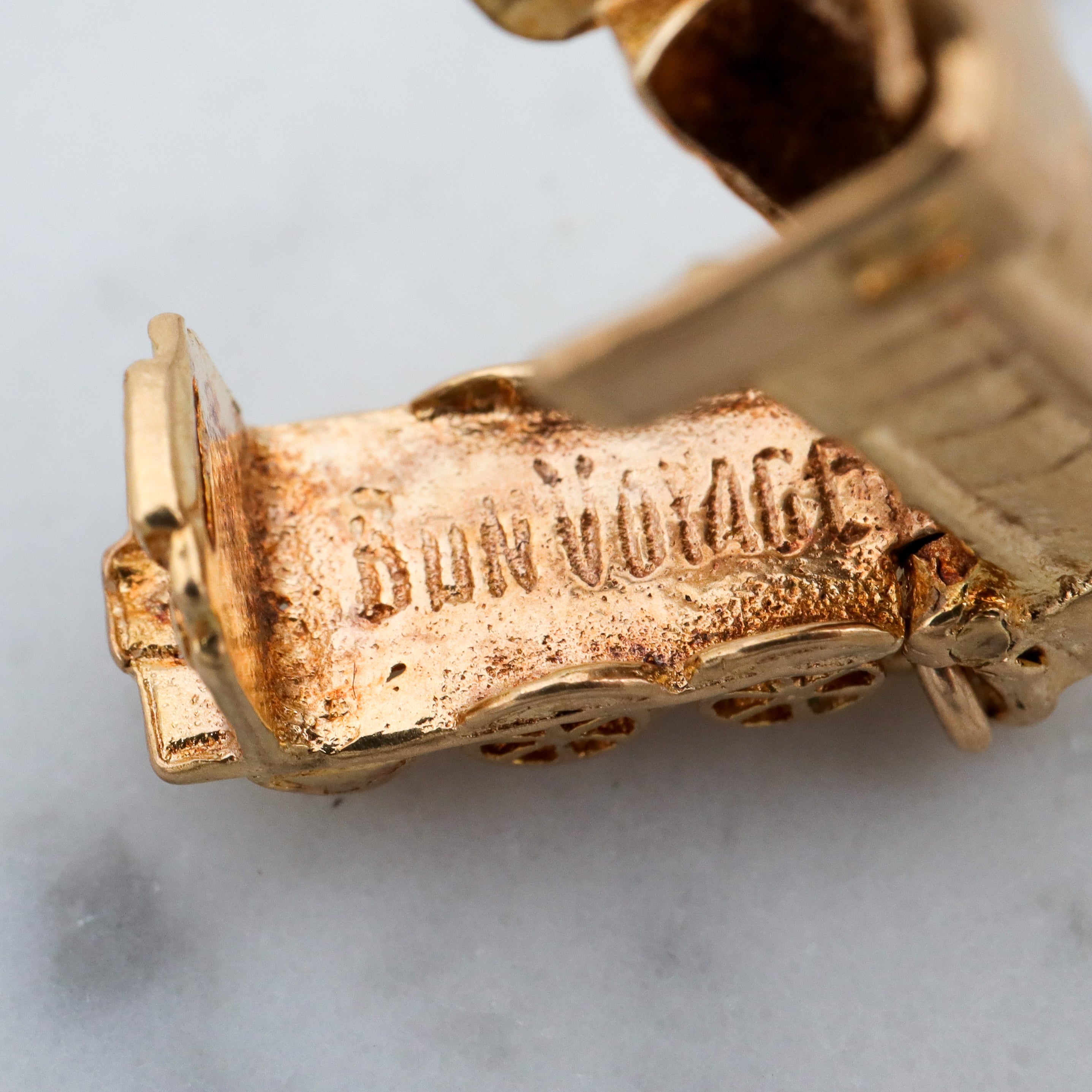 Vintage English 9k gold opening “Bon Voyage” locomotive charm